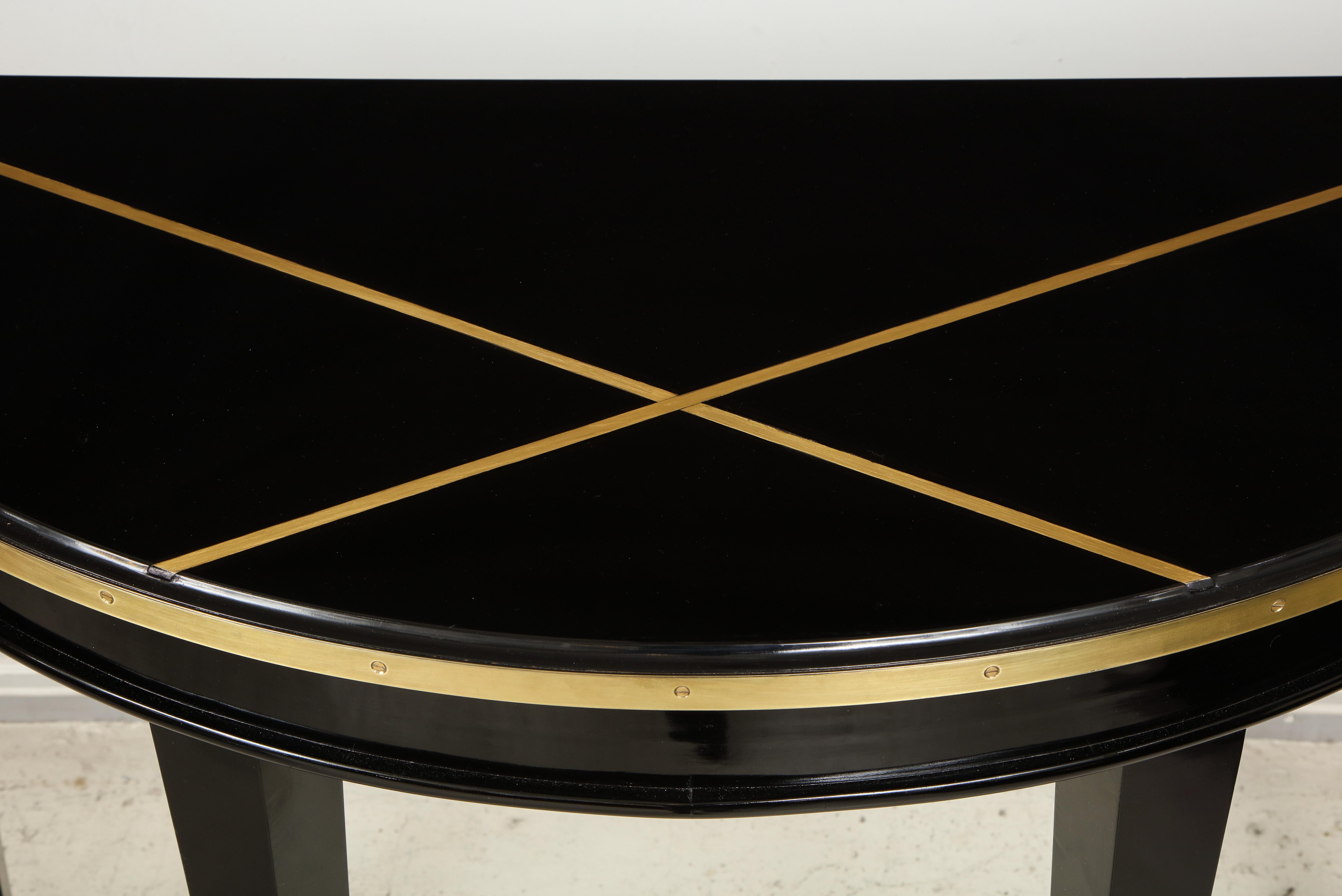 Contemporary Custom Pair of Ebonized Demilune Consoles with Inlaid Brass Top For Sale