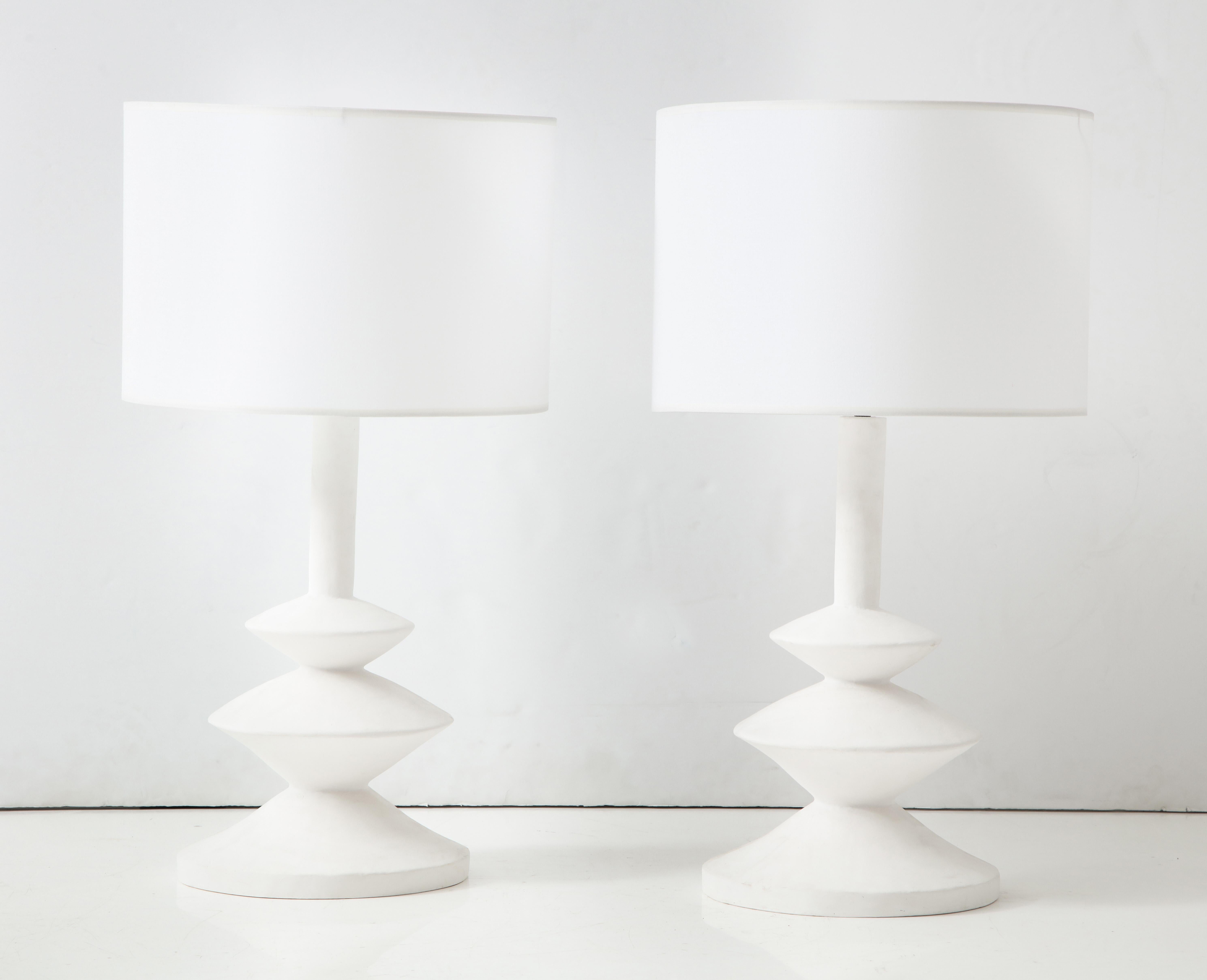 Custom pair of French plaster lamps in the manner of Alberto Giacometti.
The lamp shades are not included. One pair is currently available.
Lead Time for custom made is 8-10 weeks.