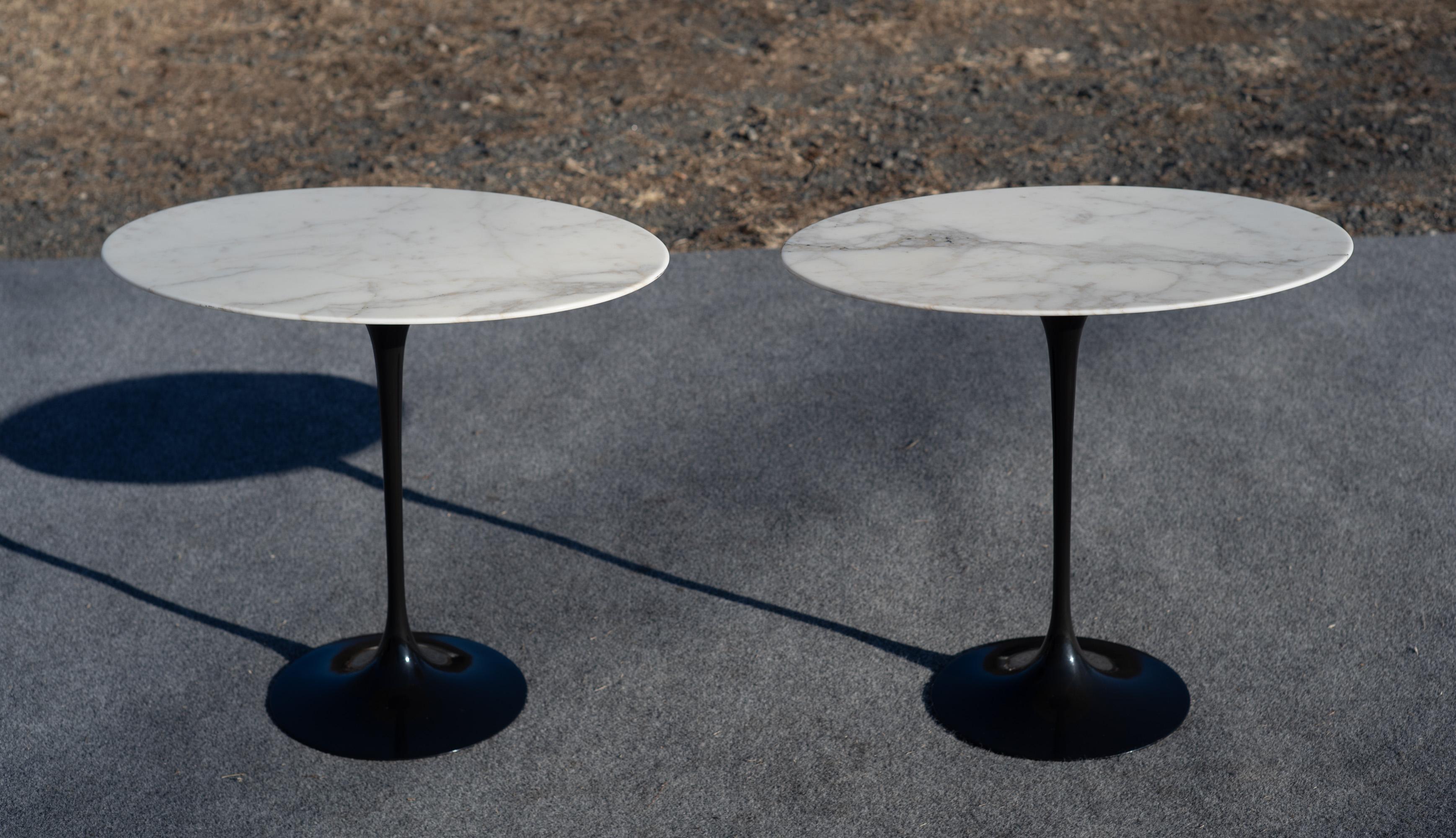 Pair of contemporary, Eero Saarinen for Knoll Studio, signed marble top side tables. The tops are oval, 22.5