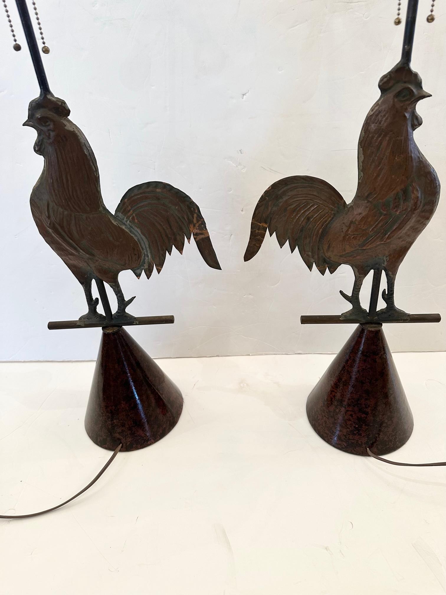 Rooster lovers whimsical pair of custom table lamps made from vintage metal rooster sculptures and paired with fabulous handpainted shades.
Diameter of bases 7