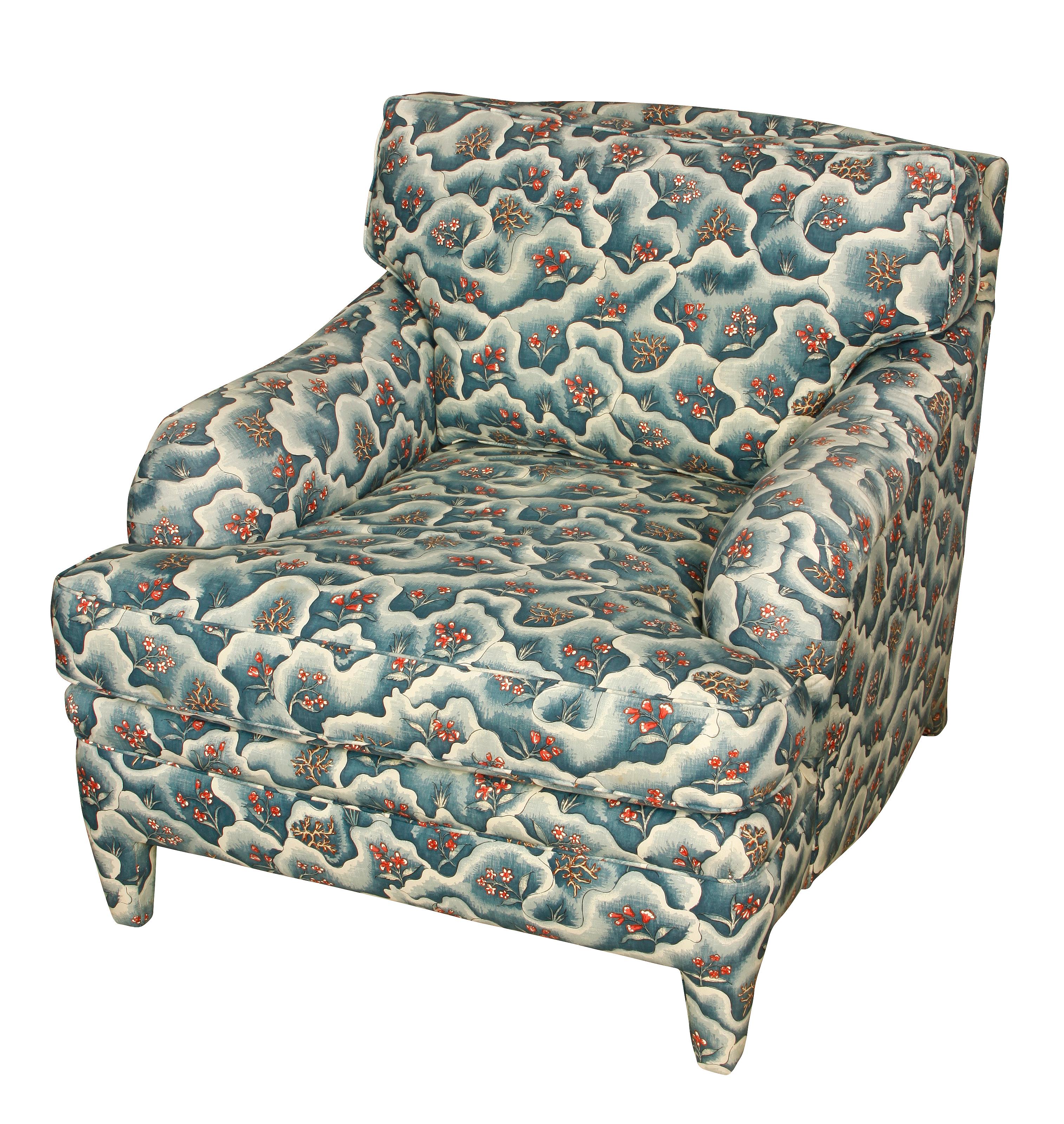 Custom parsons leg upholstered armchair and ottoman. Very comfortable and pretty blue print. Chair measures 27.5