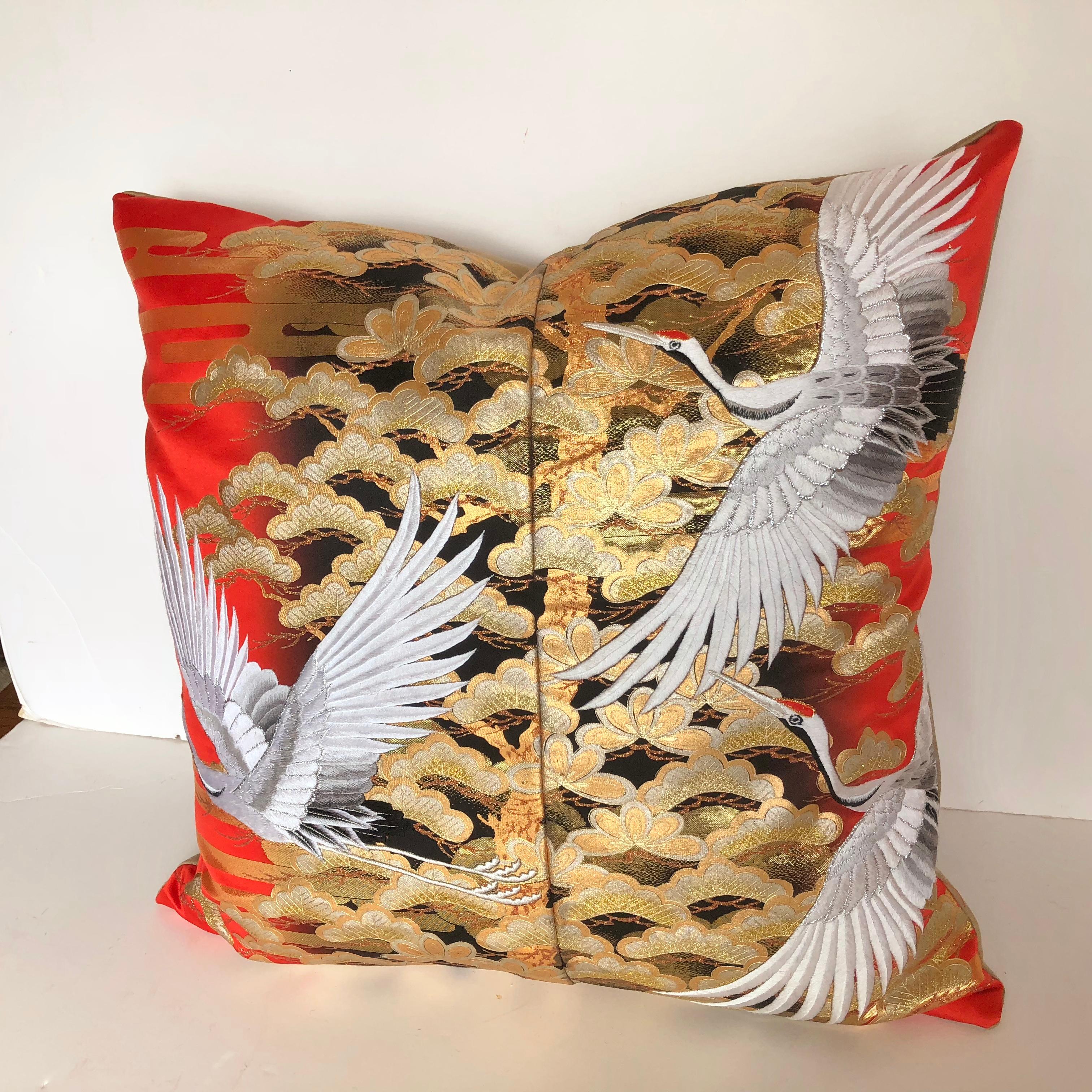 Custom pillow cut from a vintage Japanese silk uchikake, the traditional wedding kimono. Traditional designs are hand painted and embroidered on the silk. Pillow is backed in a taupe silk, filled with an insert of 50/50 down and feathers and hand