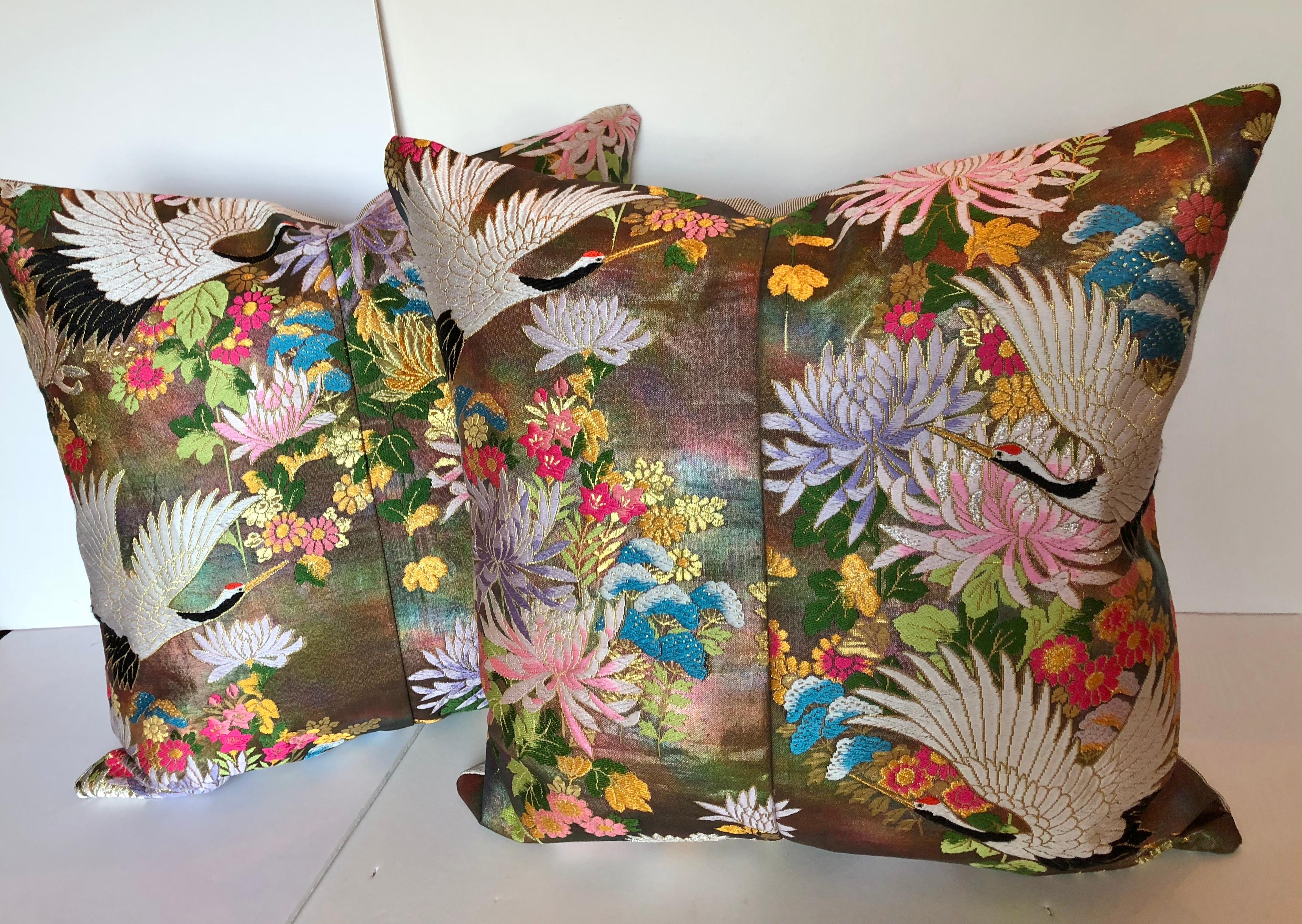 Custom pillows cut from a vintage Japanese Silk Uchikake, the traditional wedding kimono. Traditional Japanese flowers and birds with gold and silver metallic accents on an ombre background. Pillows are backed in silk, filled with an insert of 50/50