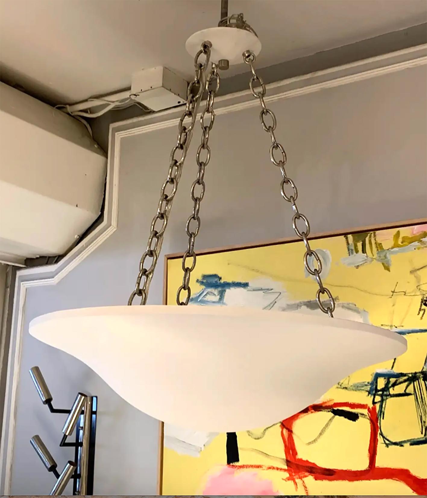 Custom plaster chandelier with brass chain. 
Please note that this fixtures takes E-12 candelabra bulbs, 40 watts.
Production Lead Time is 8-10 weeks.