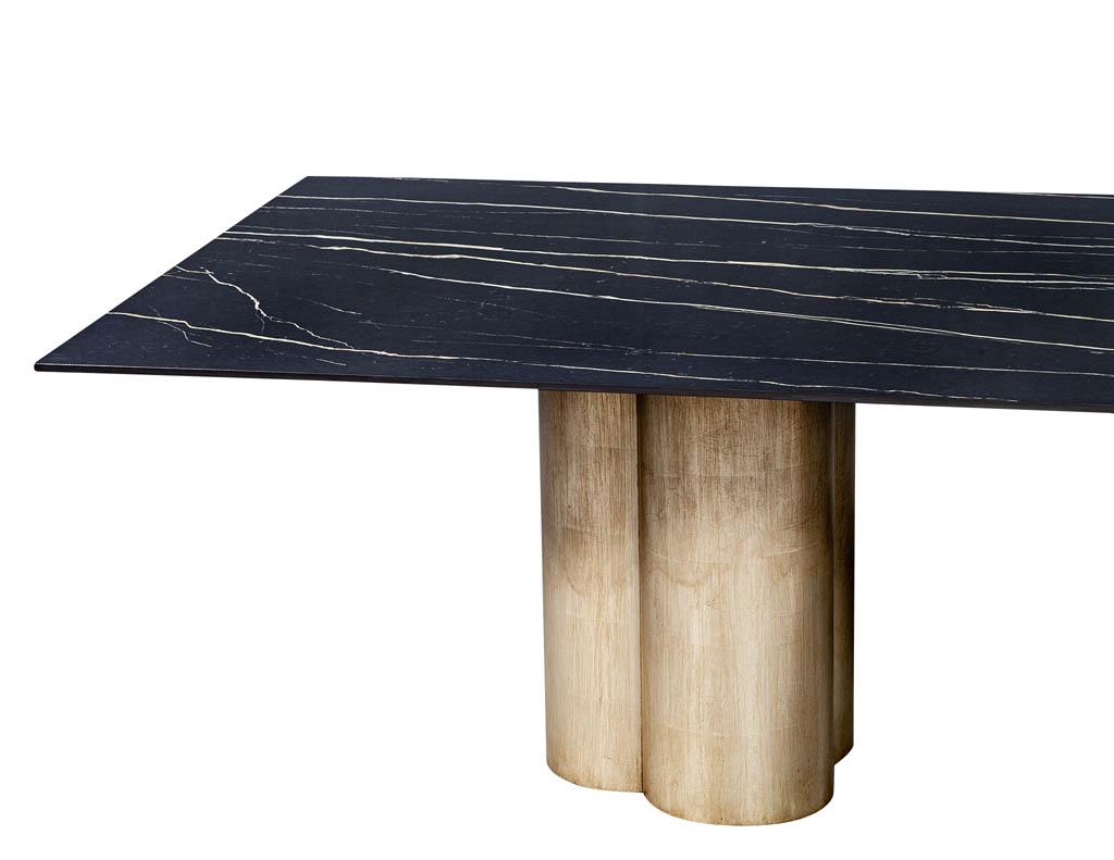Custom porcelain dining table with distressed silver leaf tulip bases by Carrocel. Featuring black porcelain top with custom finished tulip bases in a distressed silver leaf.
Price includes complimentary curb side delivery to the continental USA.