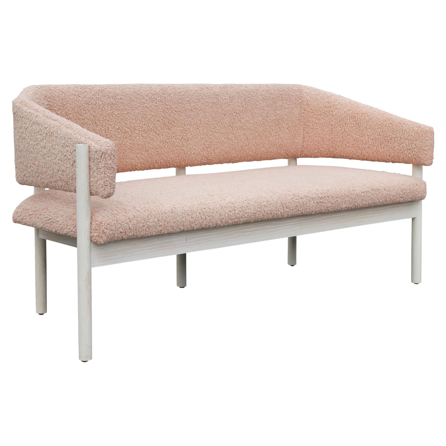 Custom-made Postmodern loveseat with light pink shearling style Kravet Fabric. This bench was custom designed and manufactured in Houston Texas. We have a pair available. Gorgeous in person. Please inquire about custom finishes and