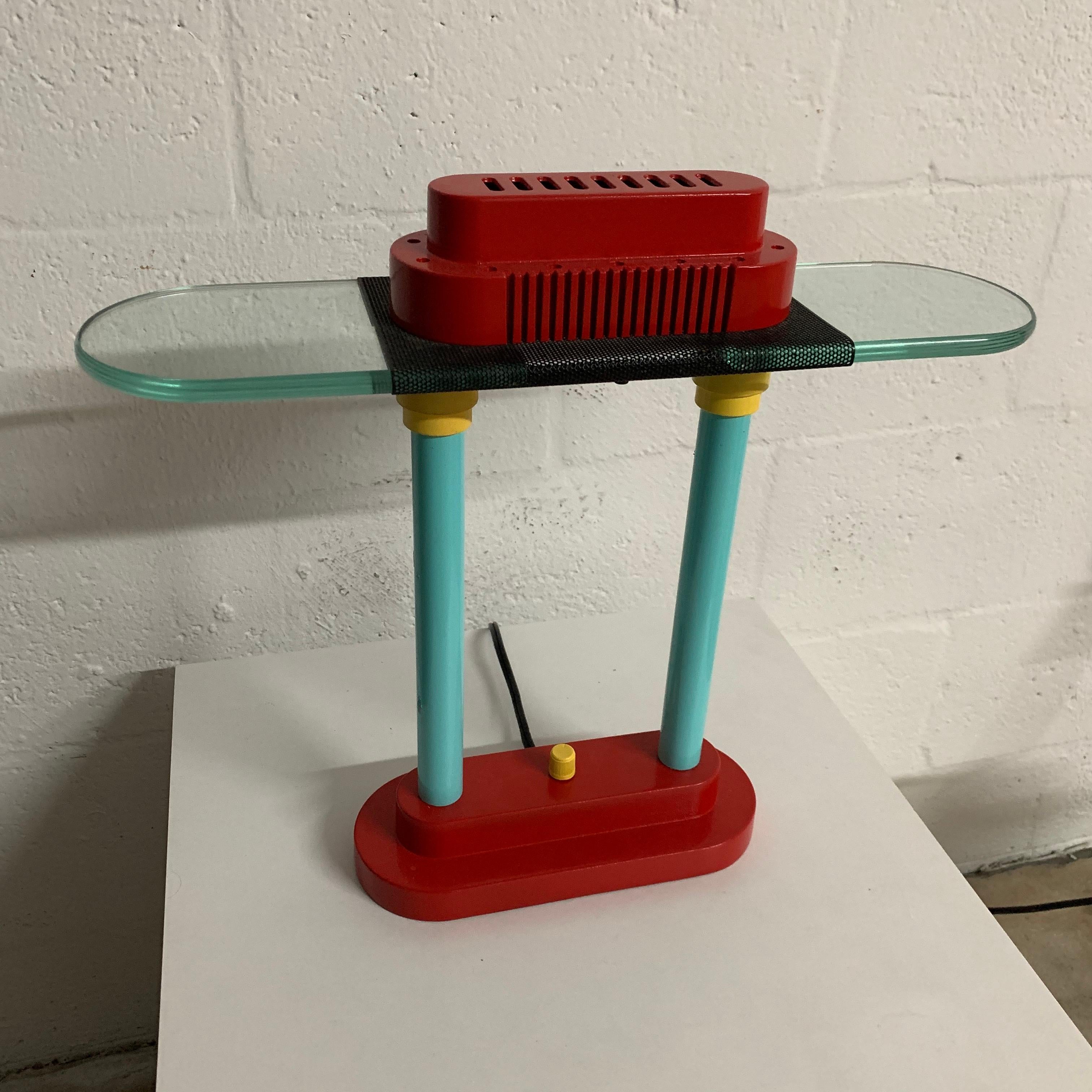 Postmodern library desk table or task lamp rendered in hand painted metal and glass in the Memphis style by Robert Sonneman for George Kovacs, 1980s.