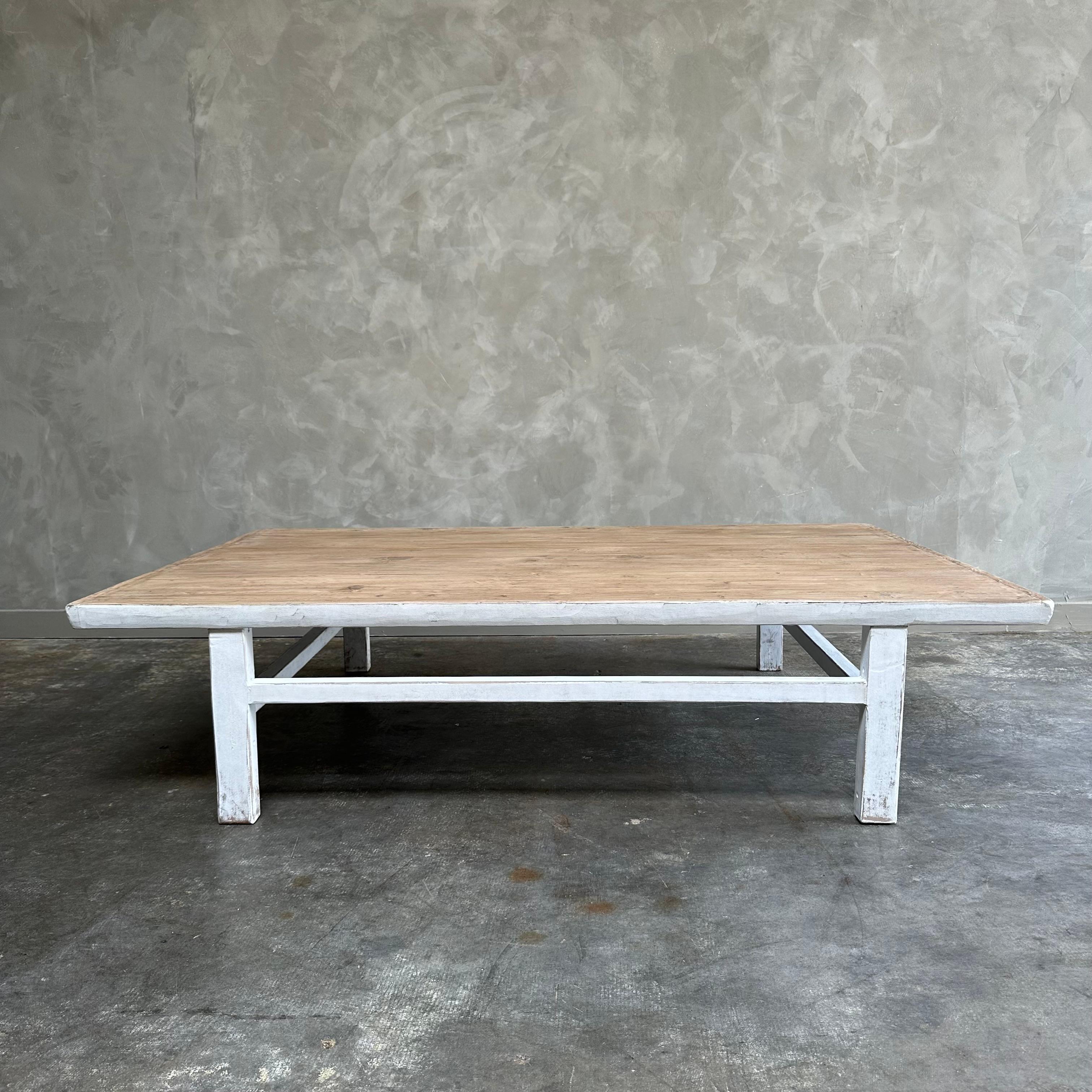 Custom made bloom home inc. collection.
Large Alma Coffee table with painted base.  The top is a natural raw reclaimed elm wood with smoother finish.
Base is white distress, also available in black distress or all solid wood in bleached finish, or
