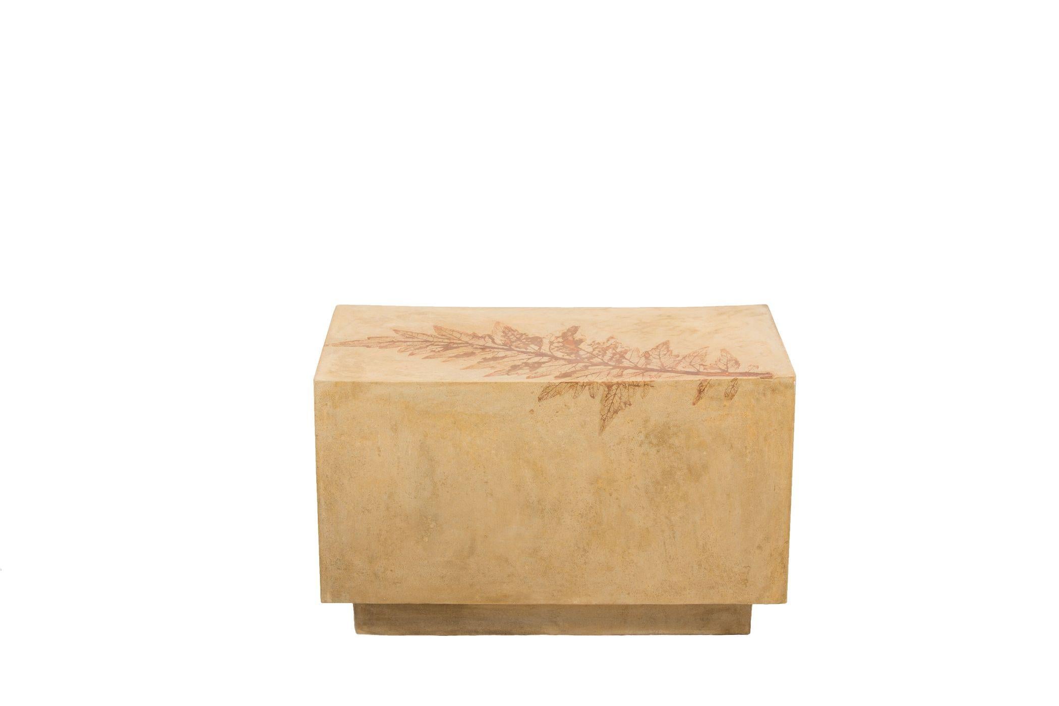 These customizable mid-weight concrete benches or coffee tables with or without impressions from real leaves can make a natural addition to nearly any room or outdoor environment.

The fossil-like leaf imprints soften the brutalist material of