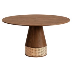 Custom Round Dining Table In Natural Walnut With Rattan Detailing