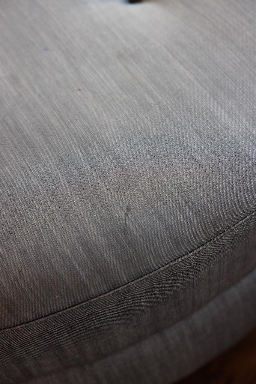 Custom Round Ottoman in Grey Denim, from ANDY COHEN'S Personal Collection In Fair Condition In Long Island City, NY