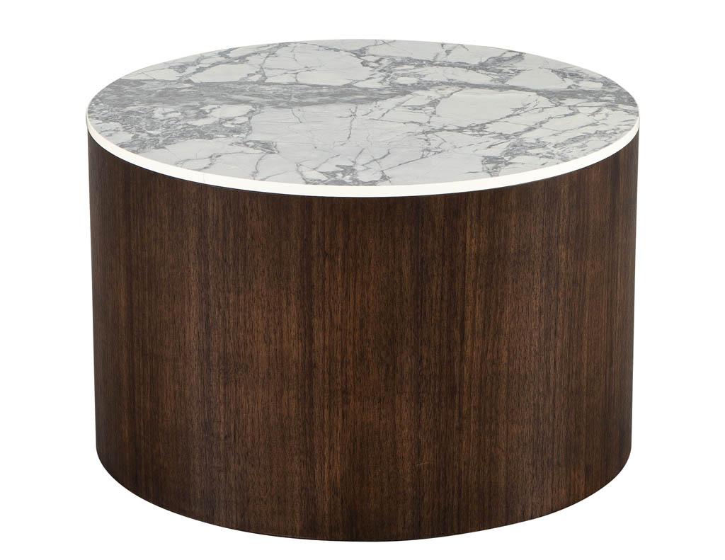 Custom round porcelain walnut side tables. Beautiful Italian porcelain top in white with contrasting grey veining pattern. Resting atop circular walnut pedestals. Finished in a medium walnut color in satin sheen. The perfect accent table for any