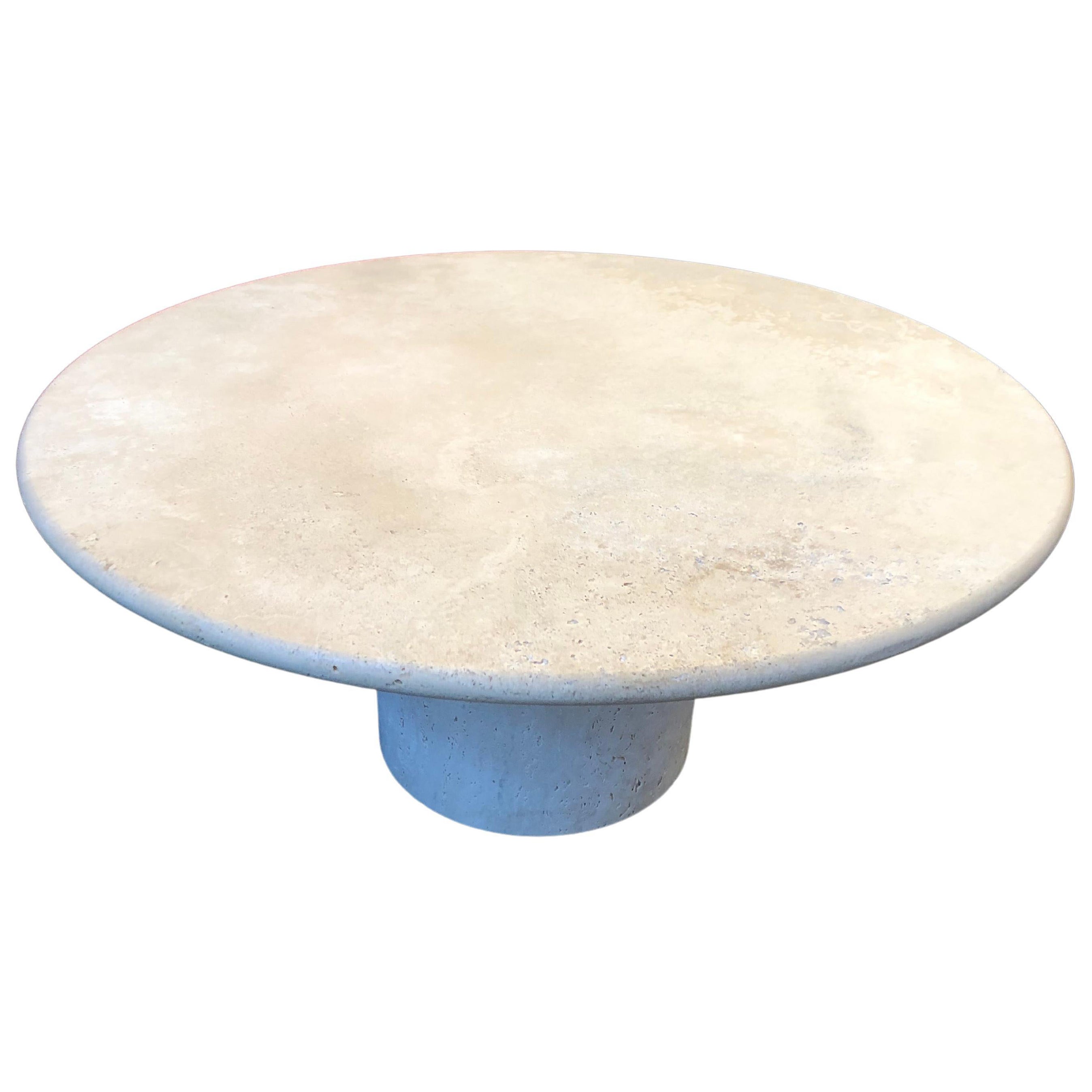 Mesa baja redonda de travertino romano hecha a medida por Le Lampade