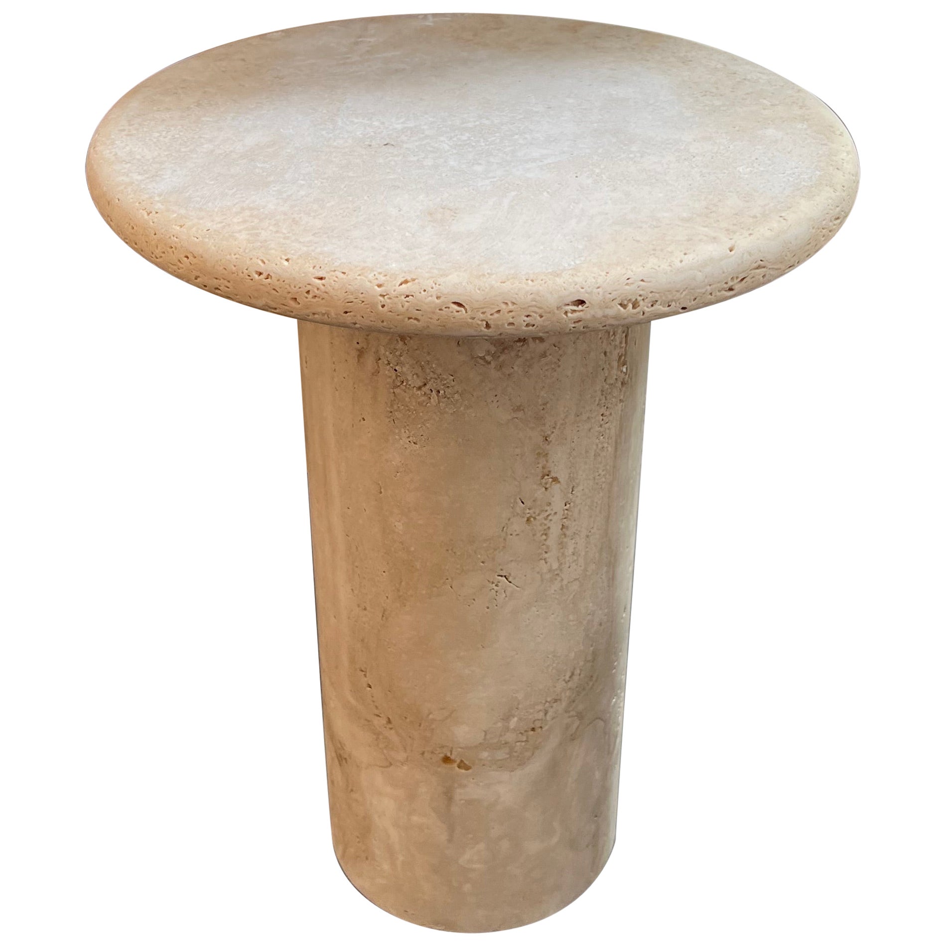 Mesa baja redonda de travertino romano hecha a medida por Le Lampade