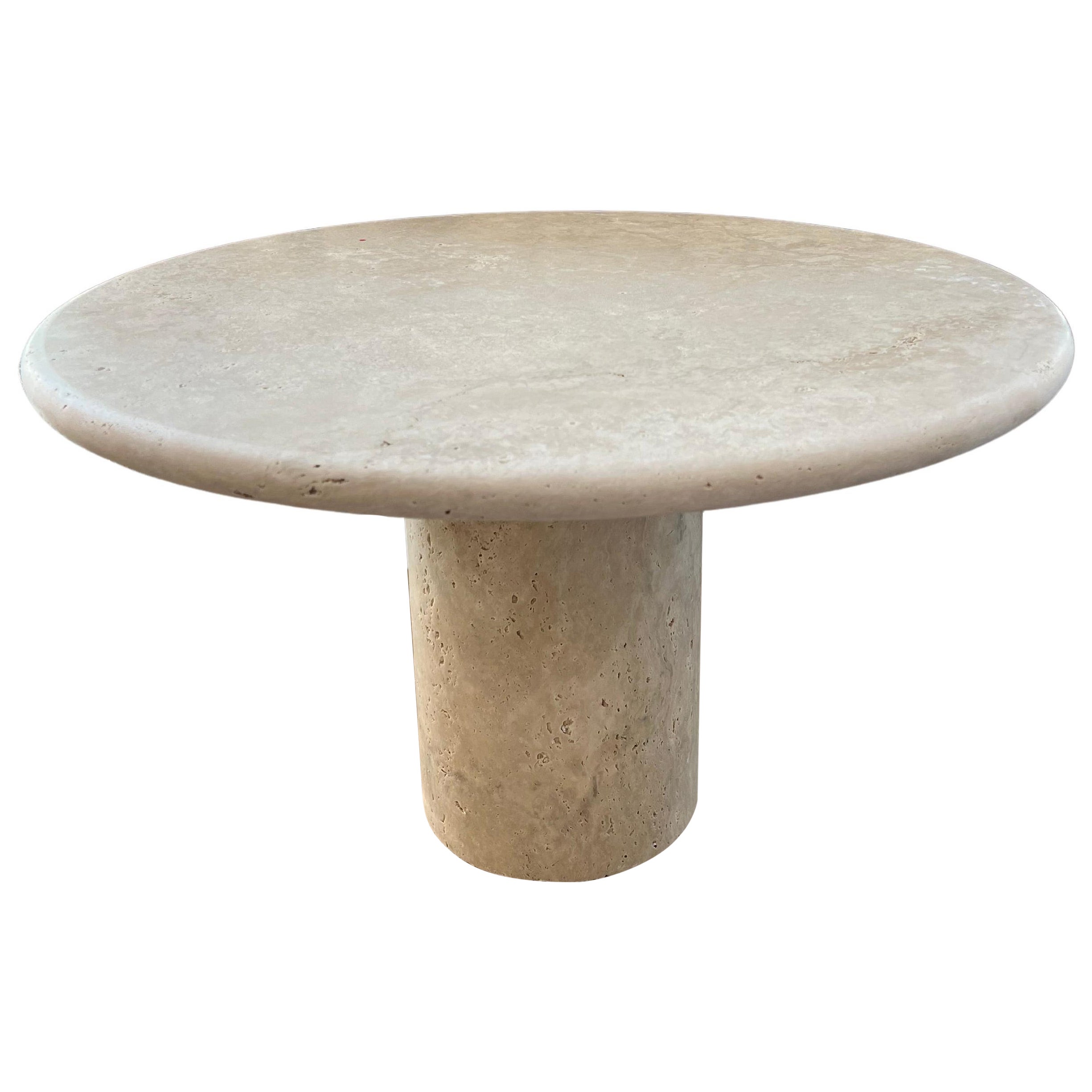 Mesa baja redonda de travertino romano hecha a medida por Le Lampade