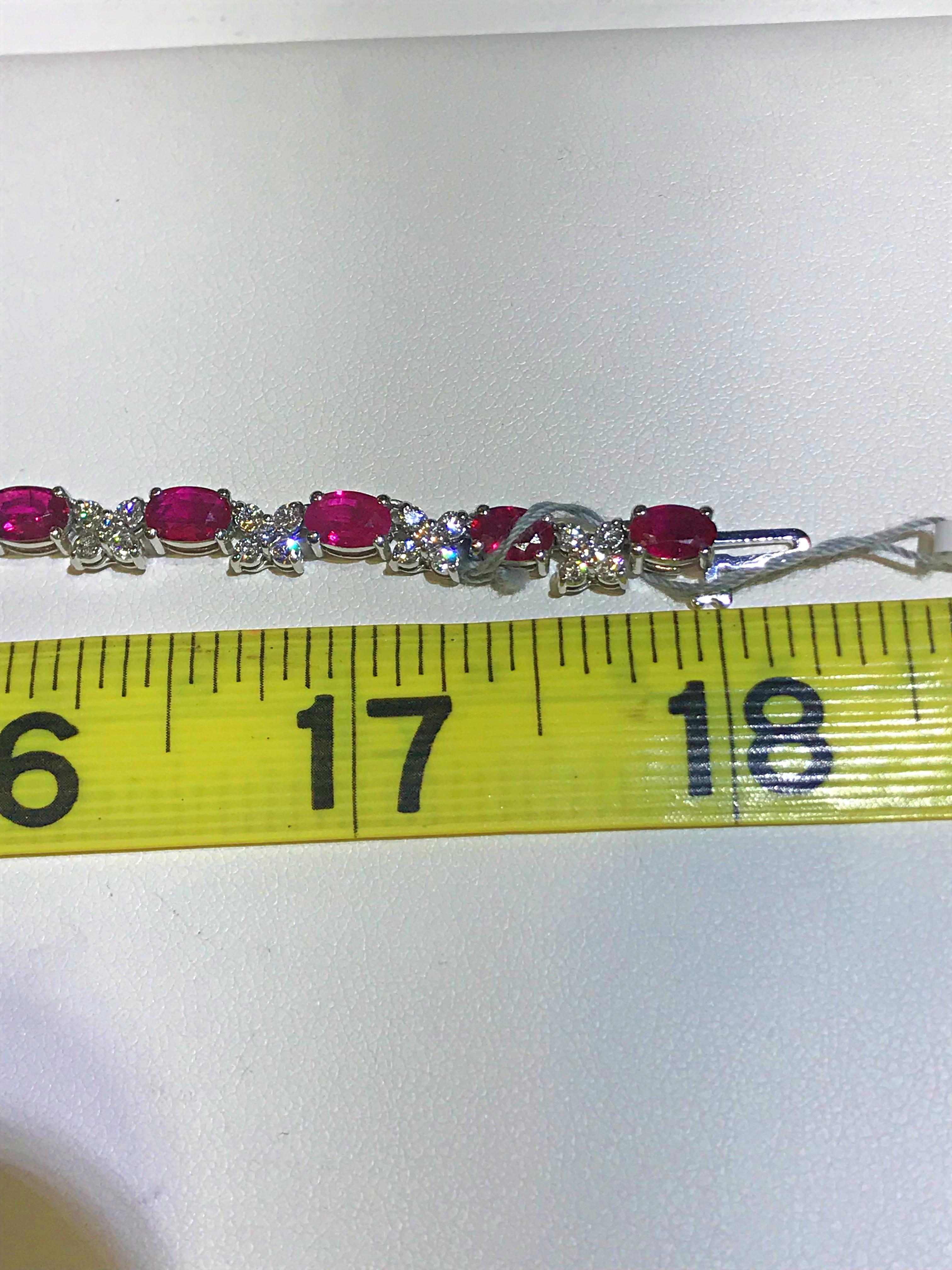 This stunning Ruby and Diamond necklace is a tennis style with alternating oval and 