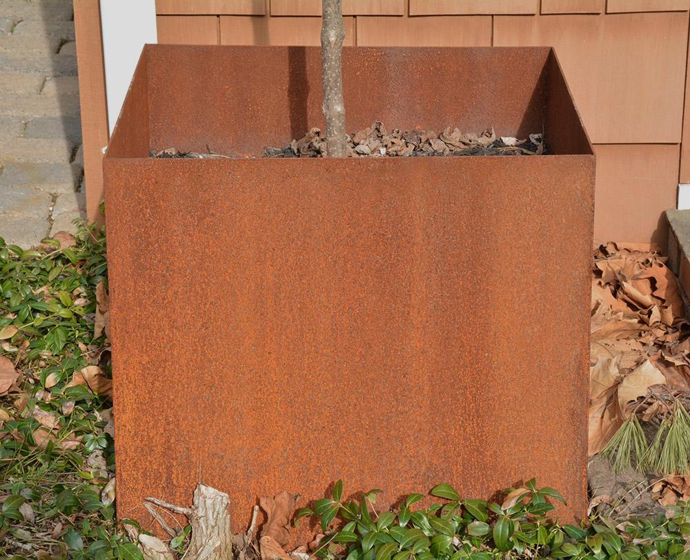 rusted metal planter boxes
