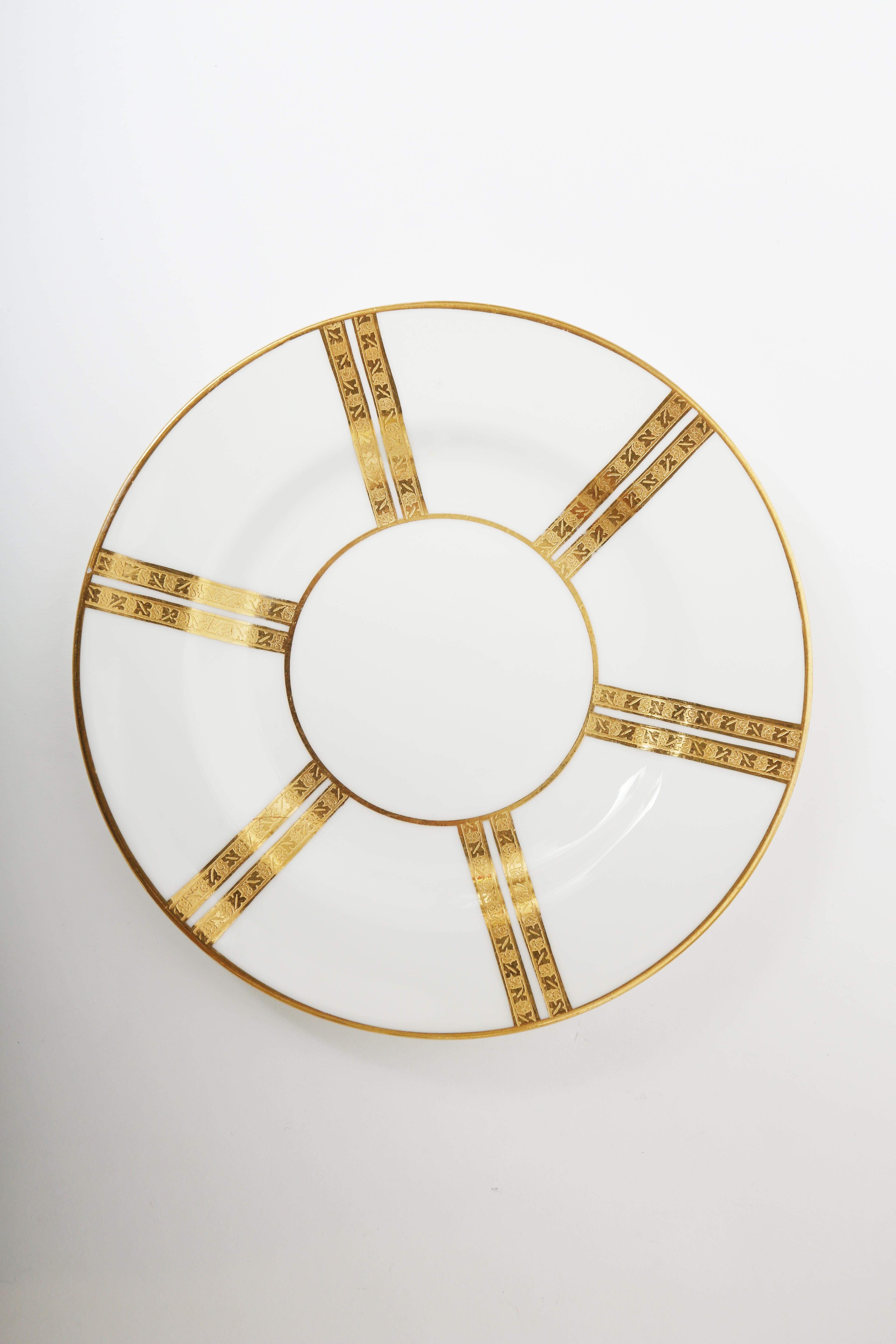 A great little set of interesting bread or side plates of fine crisp white porcelain with a 24-karat gold stripe band decoration, circa 1920. In very nice antique condition, these will mix and match in perfectly with all your fine tabletop. Custom