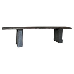 Custom sidetable with stone bases and oak top