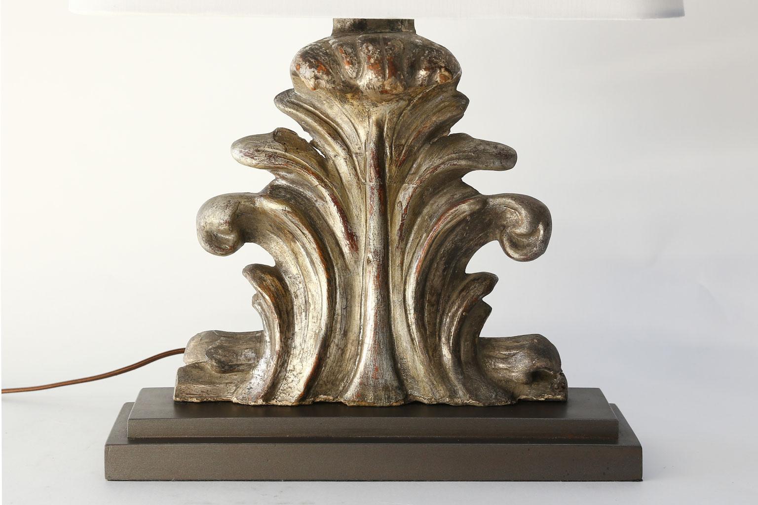 Custom silvered table lamp constructed from antique architectural fragment mounted on hand carved and painted stand. Newly wired for use within the USA using all UL approved parts. Includes complementary linen shade (listed measurements include