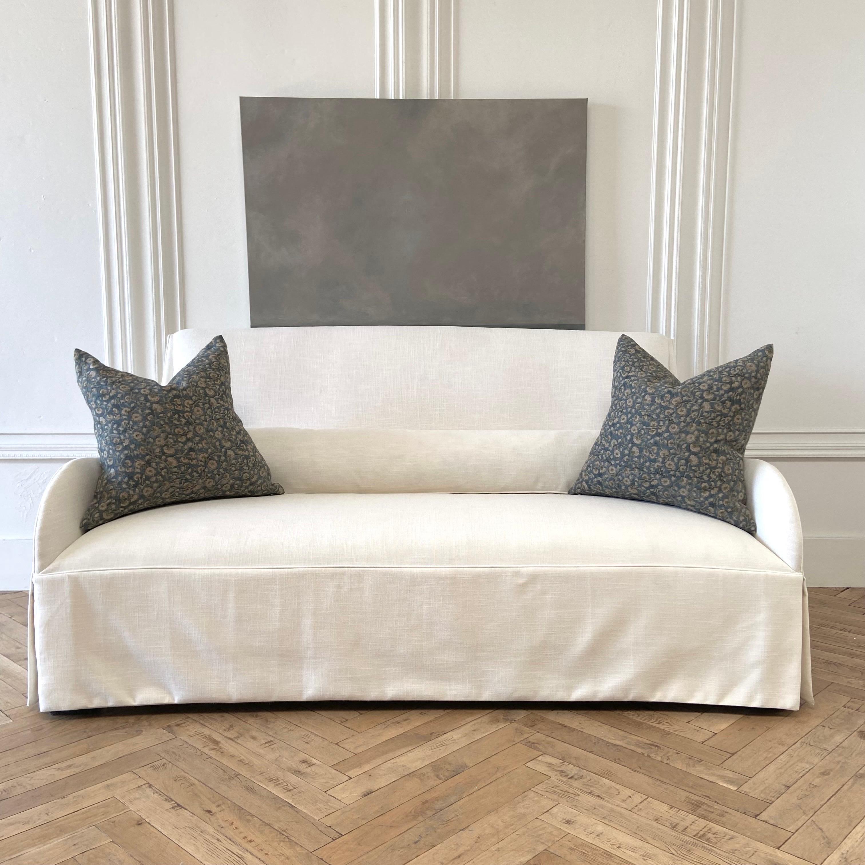 FLOOR SAMPLE SALE
Custom Upholstered Sofa / settee in a linen blend fabric
Color: off-white
Includes arm covers
pillows: Long lumbar included
Constructed of kiln dried alder wood, & HR foam
Made in North Carolina, USA 
Can be made in any of our