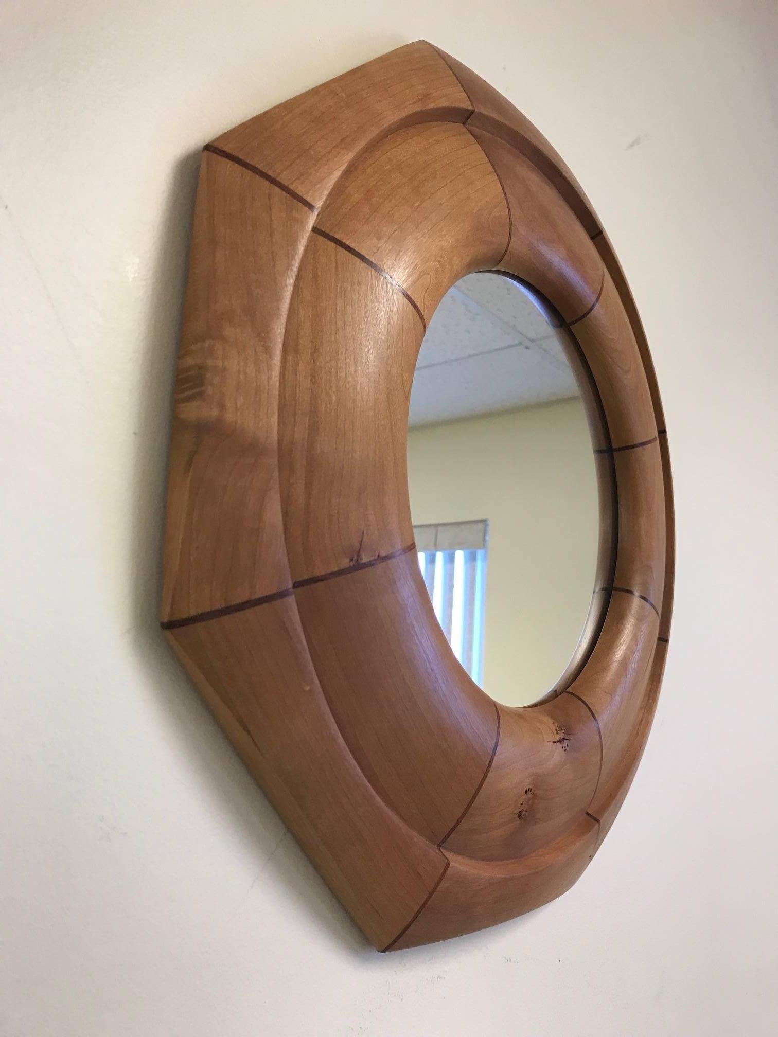 Custom solid cherrywood with walnut inlay octagonal mirror.
The mirror listed is currently available.