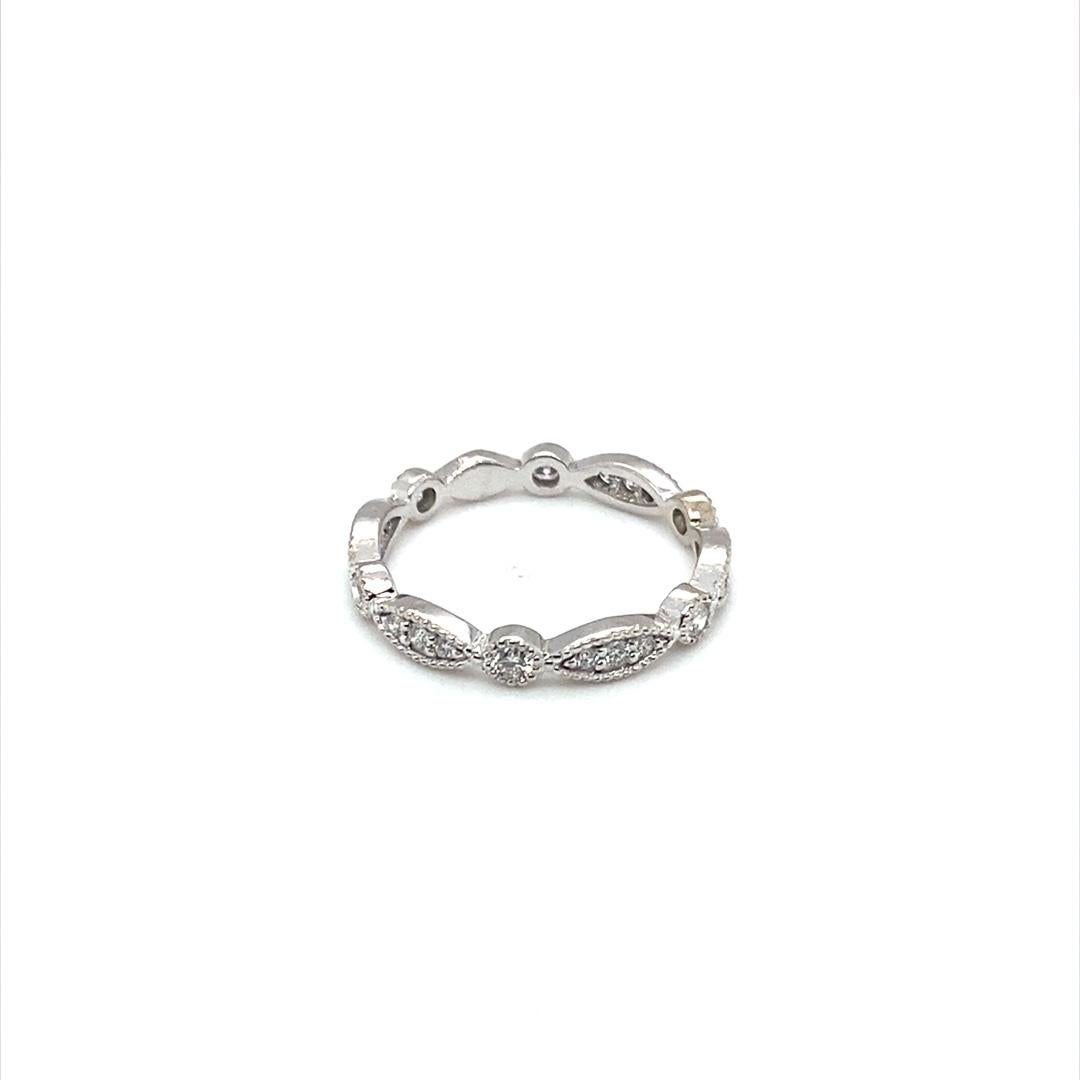 Ladies custom made diamond band, this was originally sold to match our listed 5 stone cushion ring. The ring could be purchased separately or along with the main ring.

The ring could be worn or easily stackable with other bands or an engagement