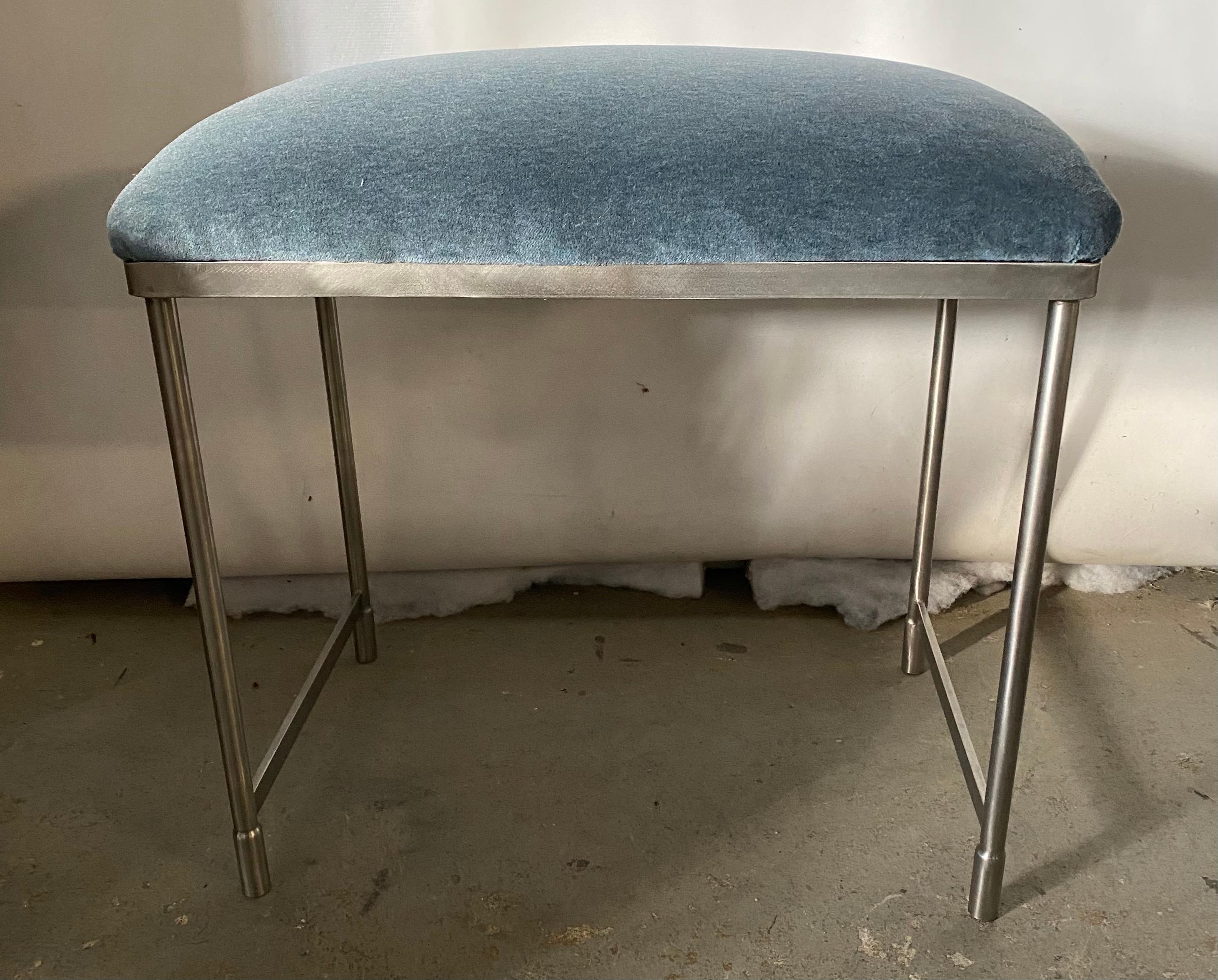 The custom stainless steel stool can be made in the size you need. Can be a bench or stool. This stool has a cushion covered in Perennial fabric. We can cover it in your favorite fabric. A vanity stool or extra seating in any room. Price quoted is