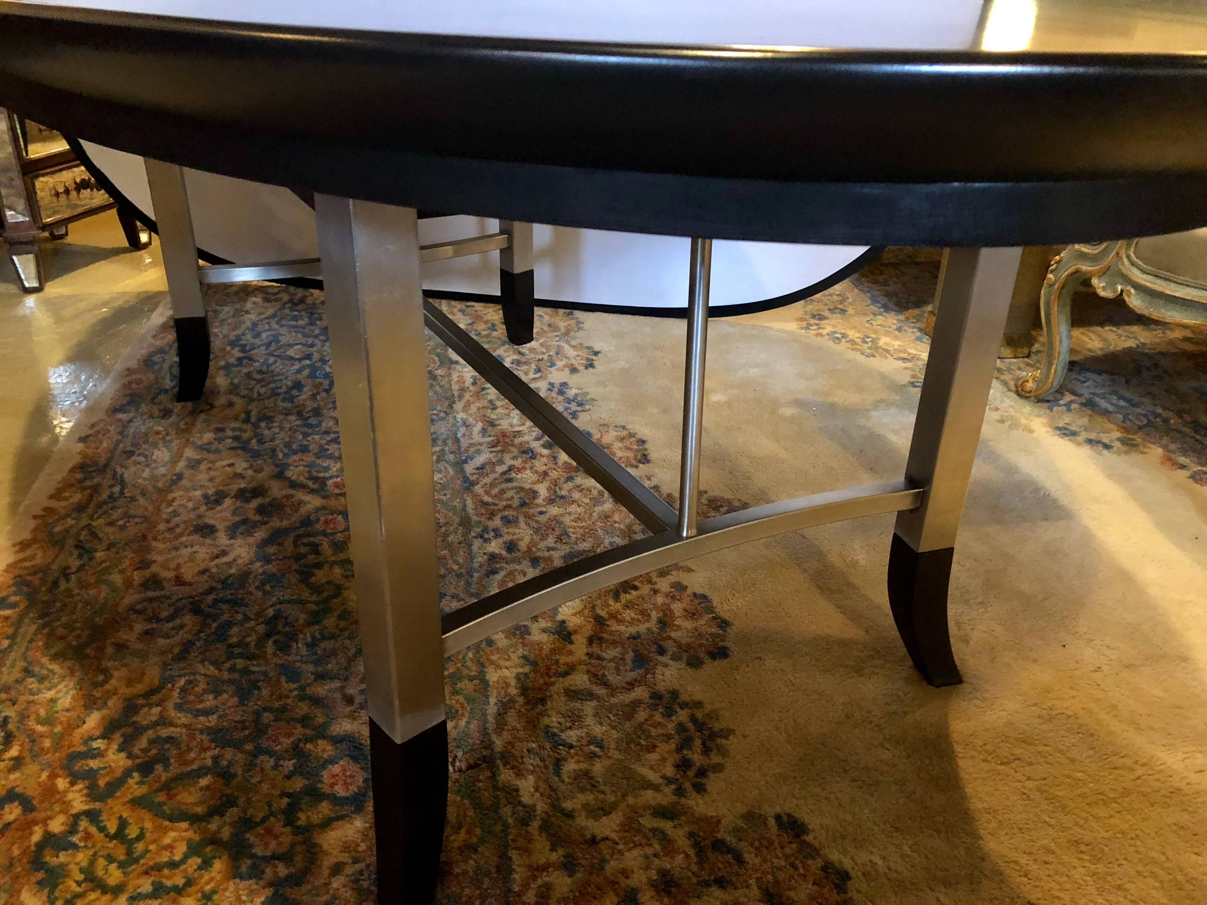American Custom Steel and Ebony Oval Design Dining Table Having Two Hide-Away Leaves