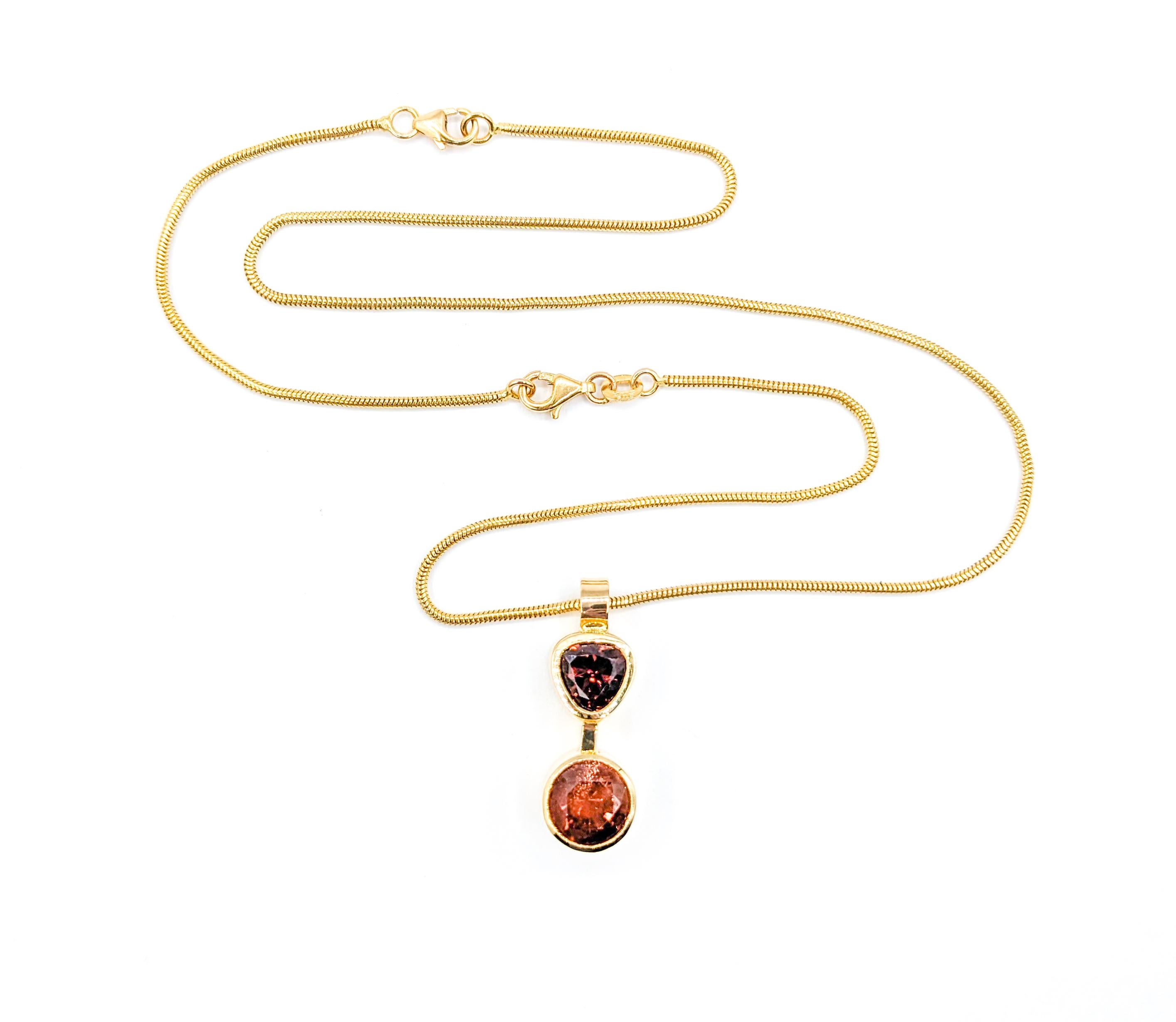 Custom Sunstone & Tourmaline Bezel Pendant Necklace

Unveil elegance with our meticulously designed pendant, handcrafted in the lustrous 14k yellow gold. At its heart lies a mesmerizing 2.5ct round Sunstone, renowned for its captivating clarity and
