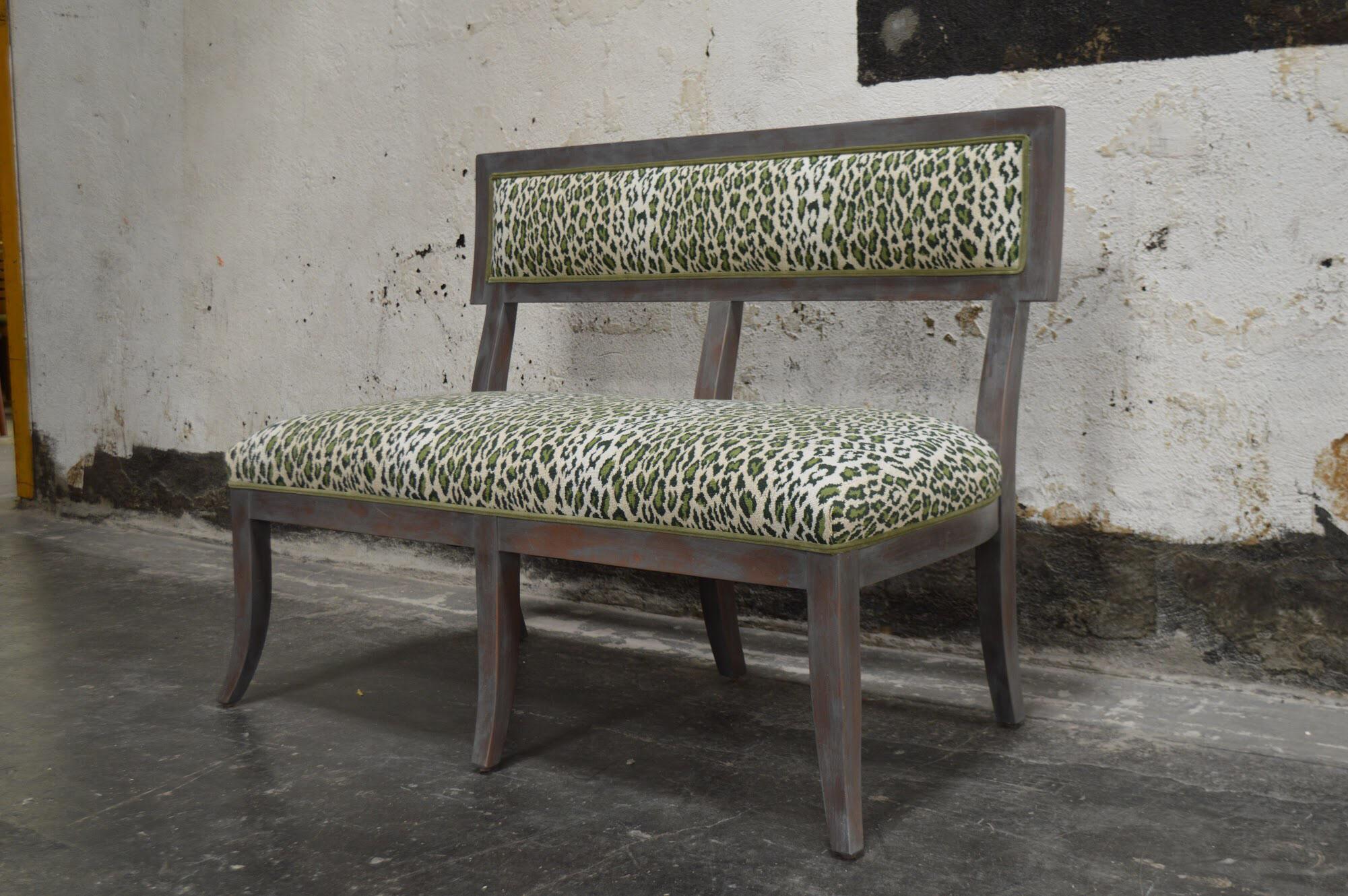 Beautifully made custom banquette or bench in distressed Swedish gray finish with green leopard grospoint fabric by Bjork Studio. In excellent condition. Perfect for an entrance, a foyer, a hallway, as a dining banquette, at the foot of a bed.