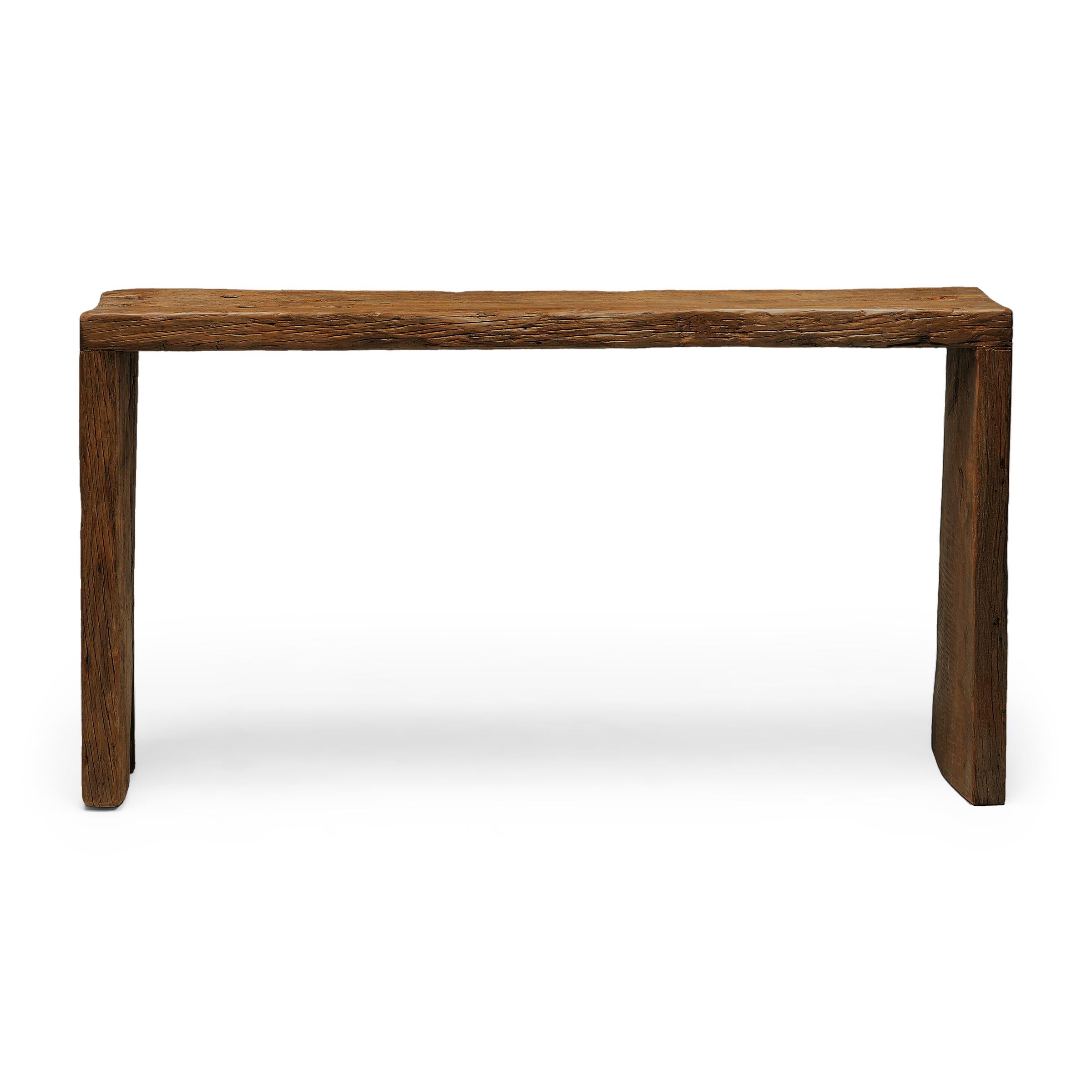 Our custom reclaimed wood console tables are hand-crafted by local artisans using architectural salvage from Qing-dynasty buildings. Each table is expertly crafted to a minimalist, waterfall design with traditional dovetailed joinery, without a