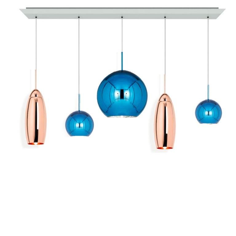 Custom Tom Dixon Linear pendant chandelier Set of 5, Copper and Blue. All pendants new in box. Ceiling pendant also new in box. 1 Blue Copper 45 cm, 2 Blue Copper 25 cm, 2 tall Copper, 5-hole linear pendant. All of the pendants are new-in-box and