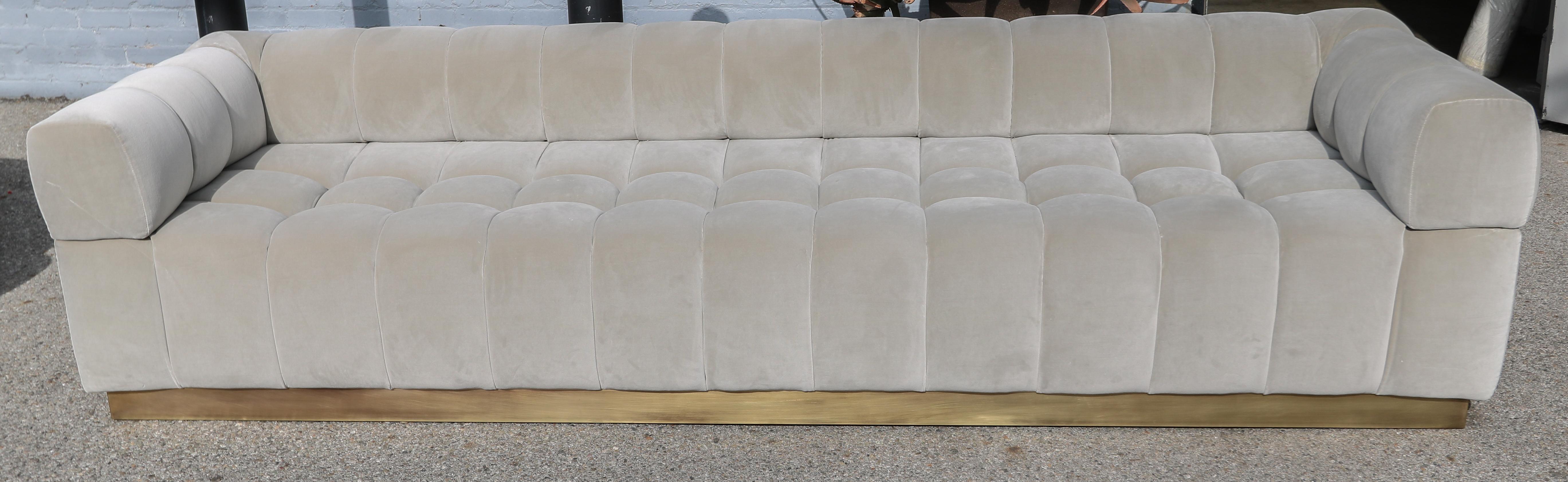 gray velvet tufted sofa