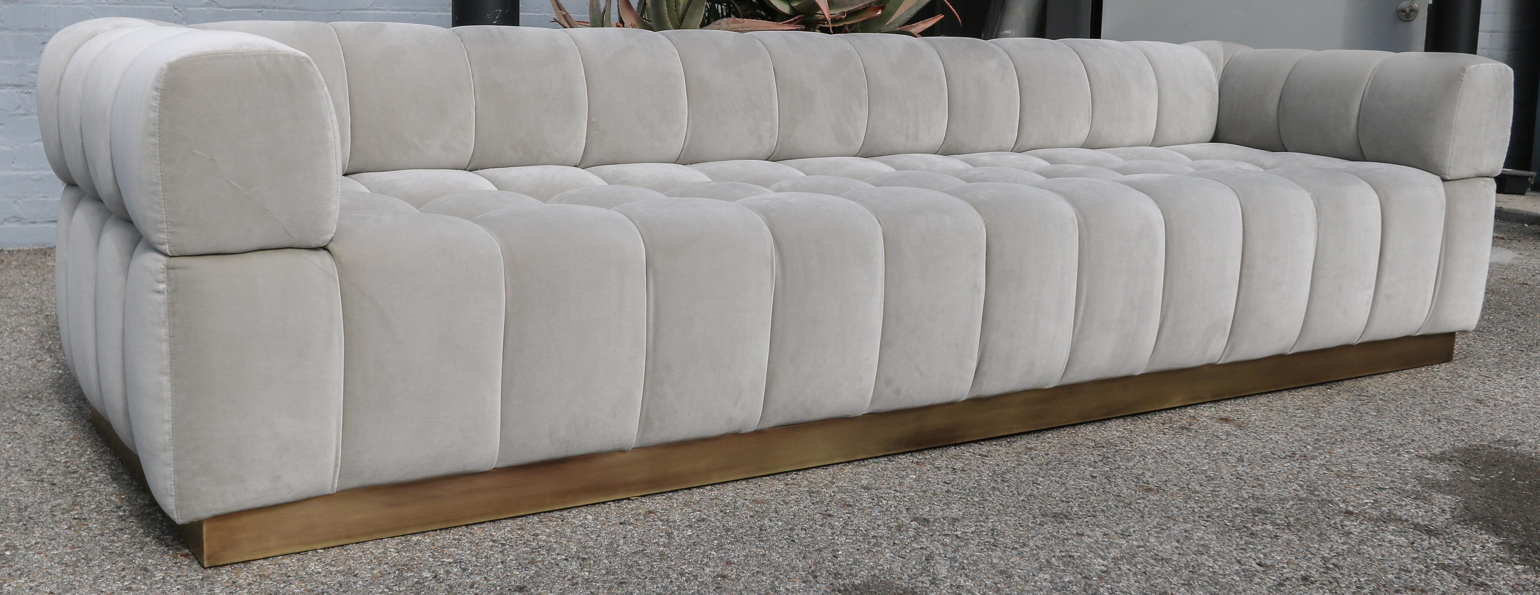 gray velvet tufted sofa