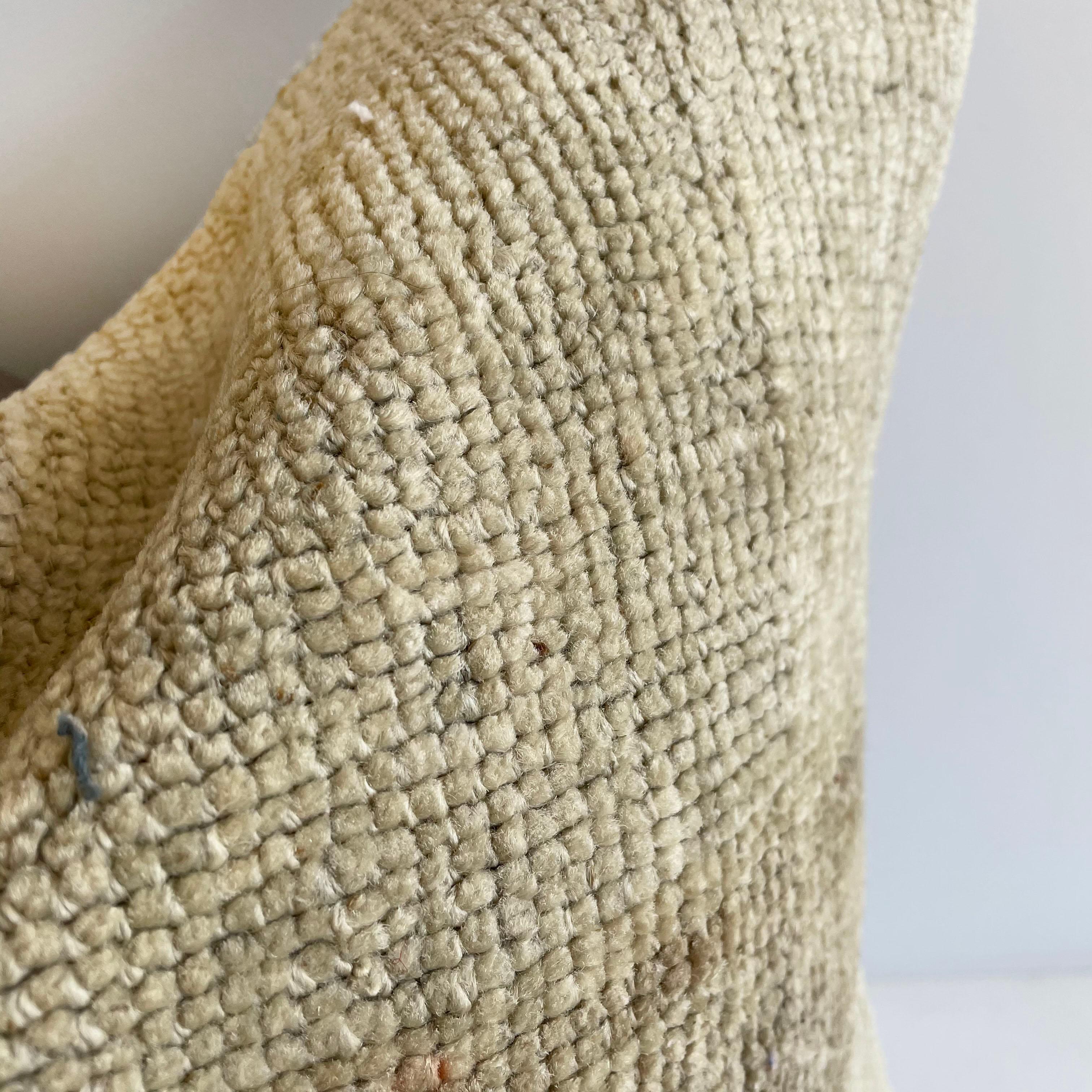 Antique woven rug pillow in natural gray brown and taupe with geometric patterns. The backside is a coordinating cotton. Our pillows are constructed with vintage one of a kind textiles from around the globe. Carefully constructed with the finest