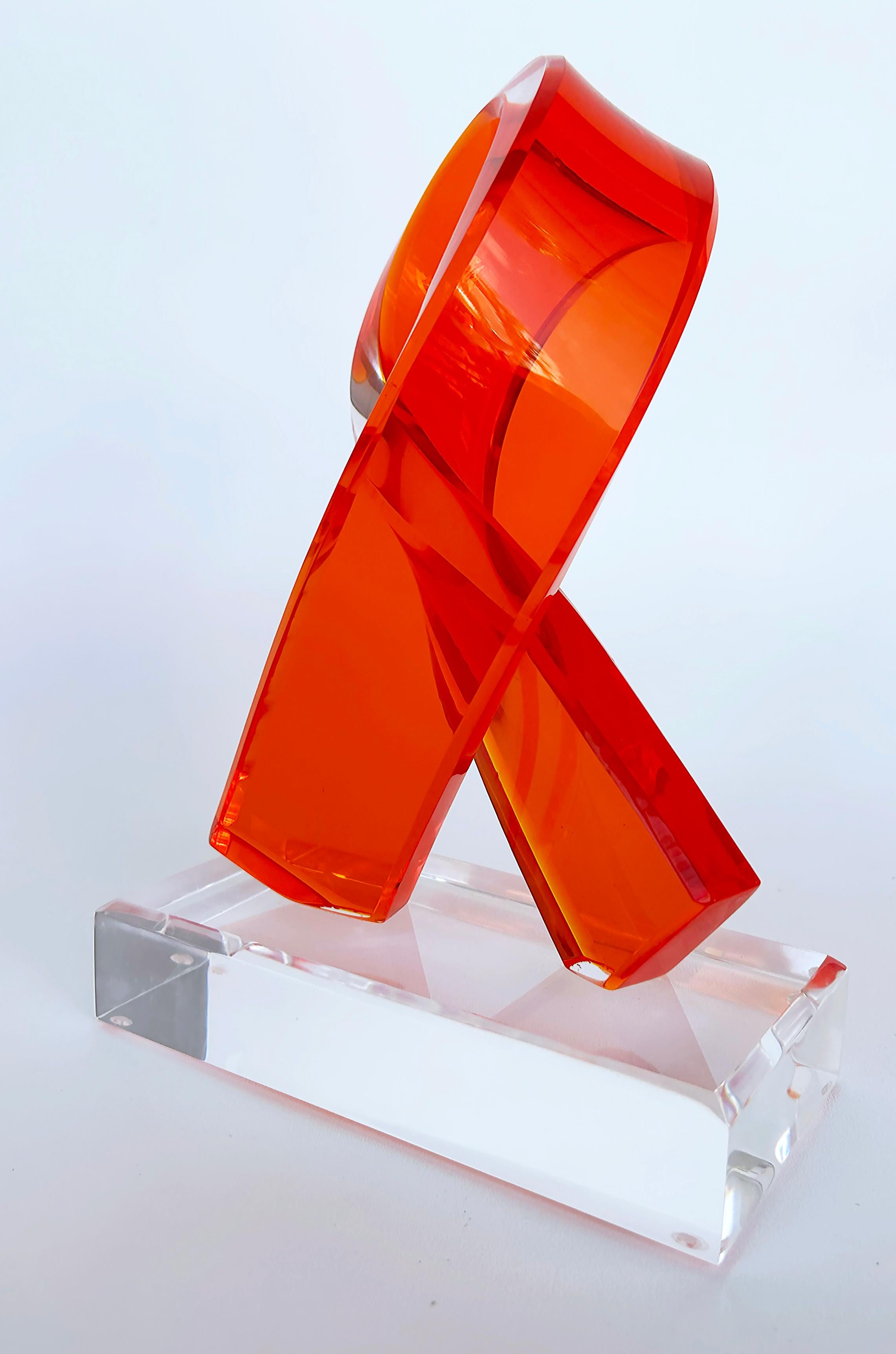 Custom Twisted Lucite Table Sculpture on Base

Offered for sale is a custom-made twisted Lucite table sculpture that is presented on a rectangular Lucite base. The sculptures can be custom-ordered in different shapes, sizes, and colors by contacting