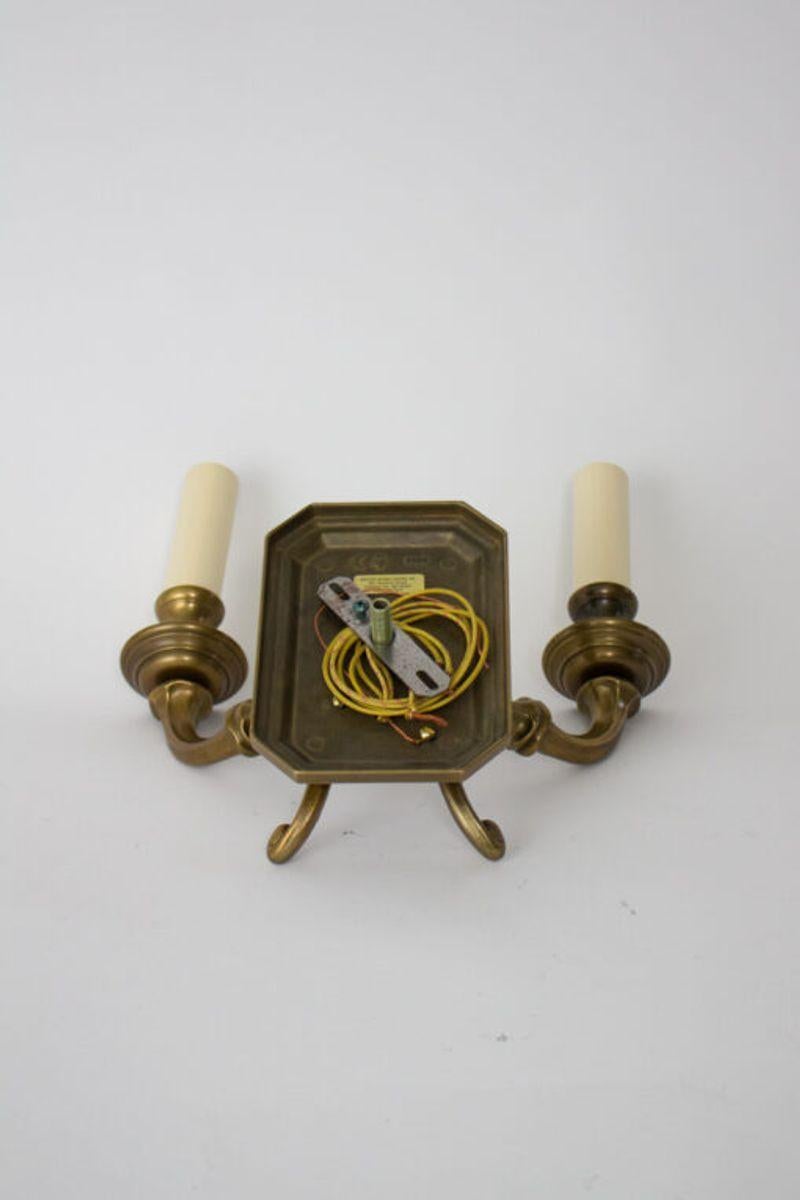 Custom Sconces with Rectangular backplate and two arms

Material: Brass
Style: Traditional
Place of Origin: United States
Period made: 1990's
Dimensions: 12 × 6 × 13 in
Condition Details: Completely Restored and Rewired, ready to install