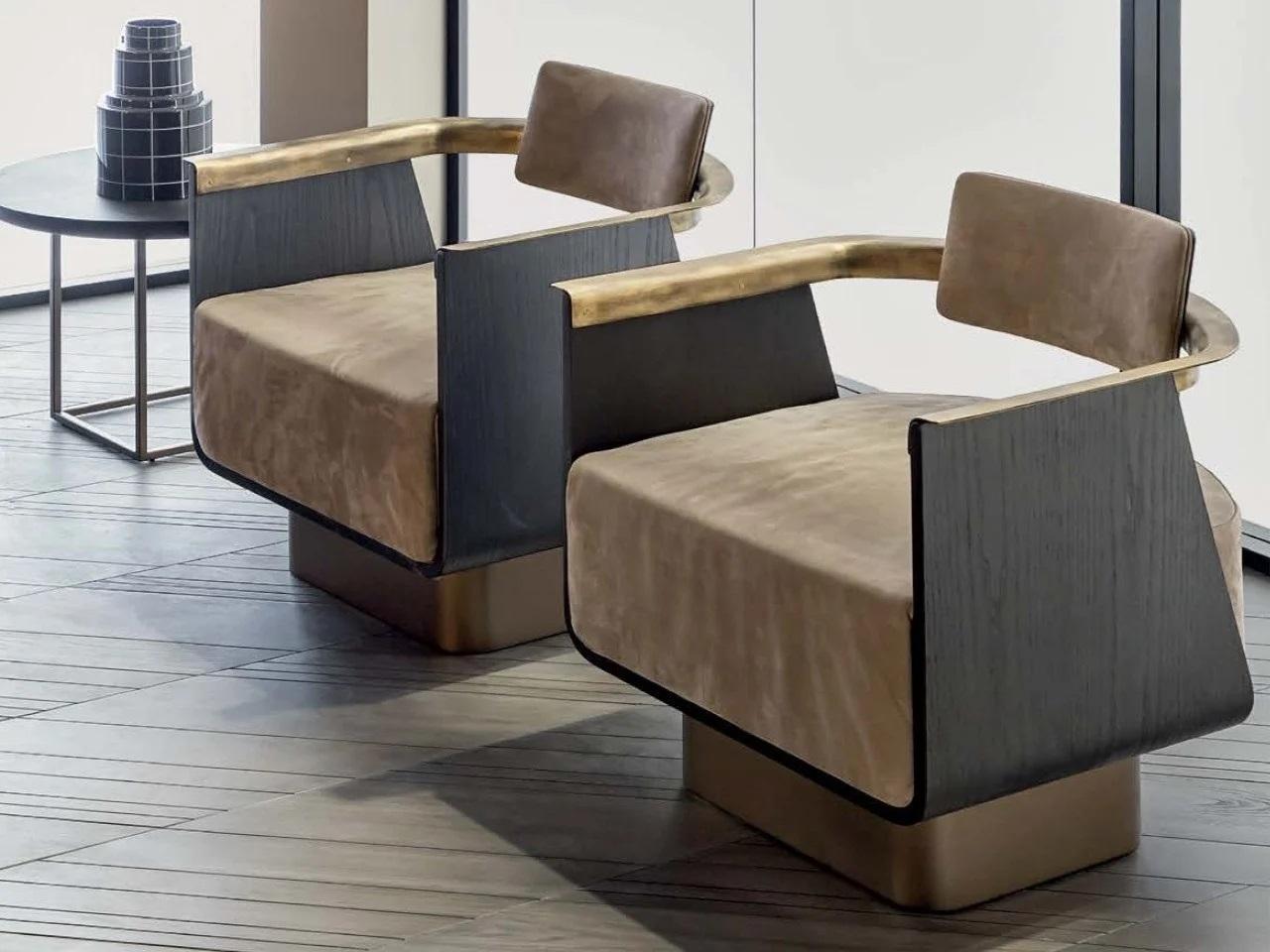 Structure in curved Ash wood, wooden base, curved back in ash plywood with upholstered and covered front, armrests in burnished brass. Seat upholstered in differentiated density polyurethane foam with acrylic fiber covering. Back upholstered in