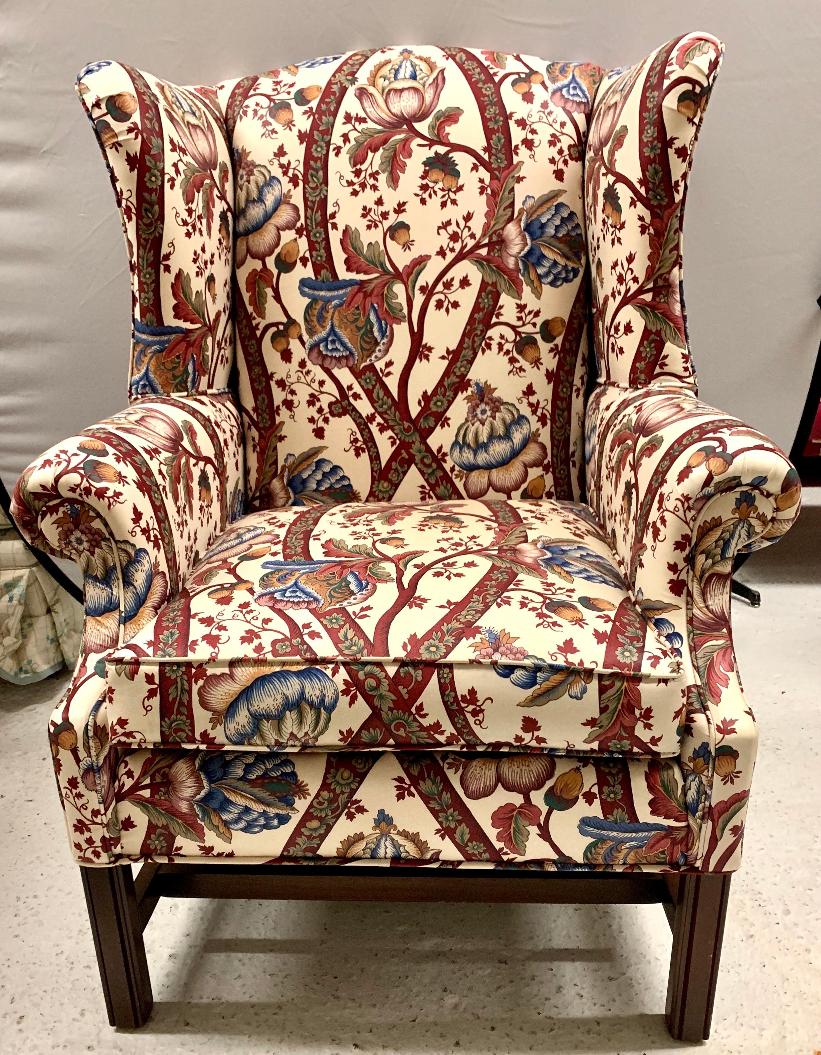 Elegant upholstered Georgian wingback chair and matching ottoman. The upholstery is spectacular.
The chair dimensions are below and the ottoman dimensions are as follows: 25