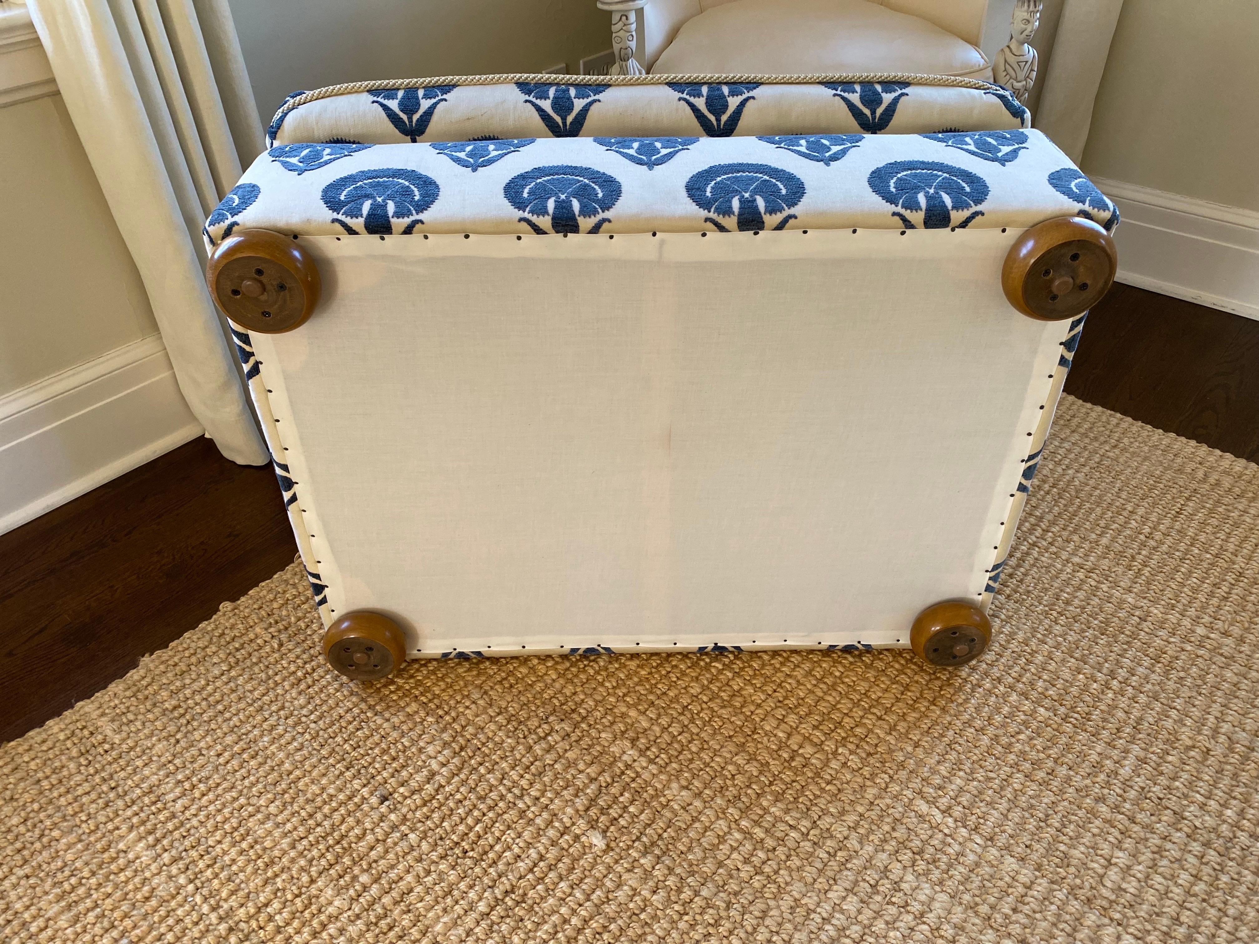 Custom Upholstered Ottoman with Bun Feet in Blue Ottoman Flower Fabric For Sale 1