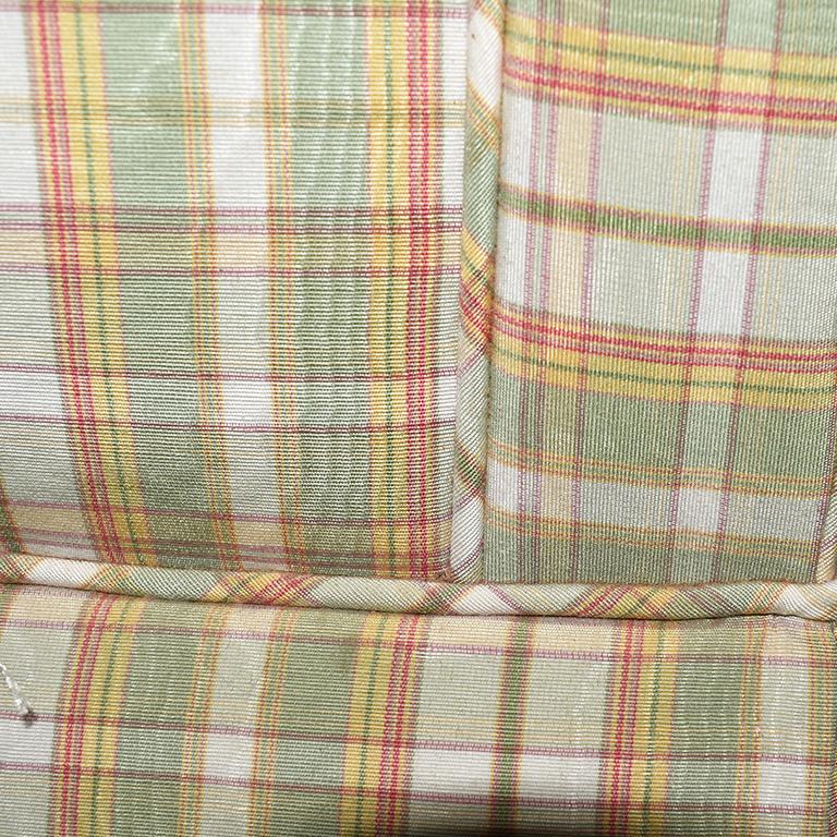 Vintage Kravet furniture track arm lounge or side chair. Covered in a light green, cream and red/orange plaid. With a straight and square back which is slightly taller than the track arms, this piece is transitional and could be upholstered to suit