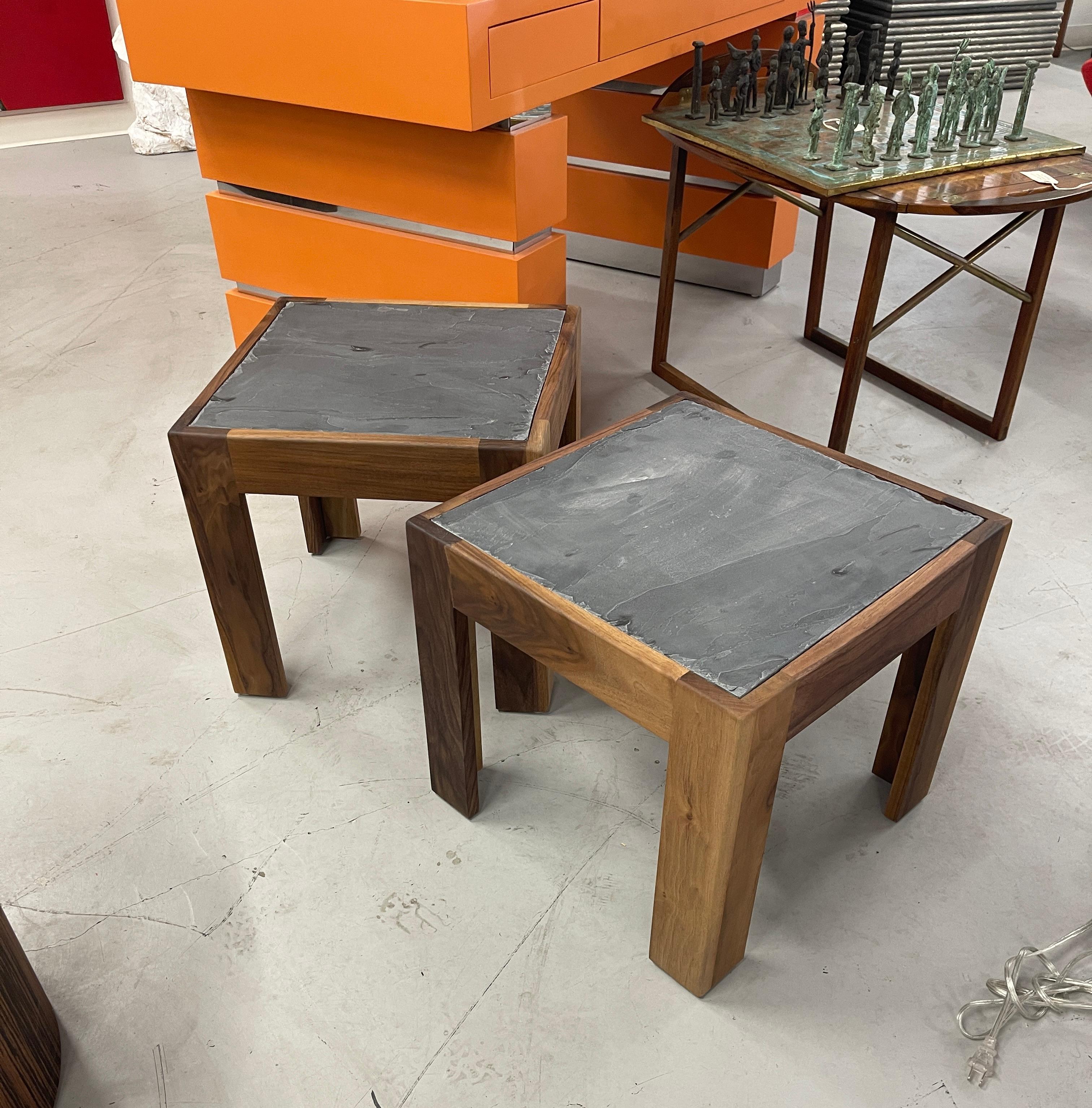 A pair of solid walnut tables with slate inset tops. Beautiful graining to the walnut sides. These are custom pieces newly made and ready to ship. The slate pieces have natural flaws, and imperfections, please see the detailed photos.