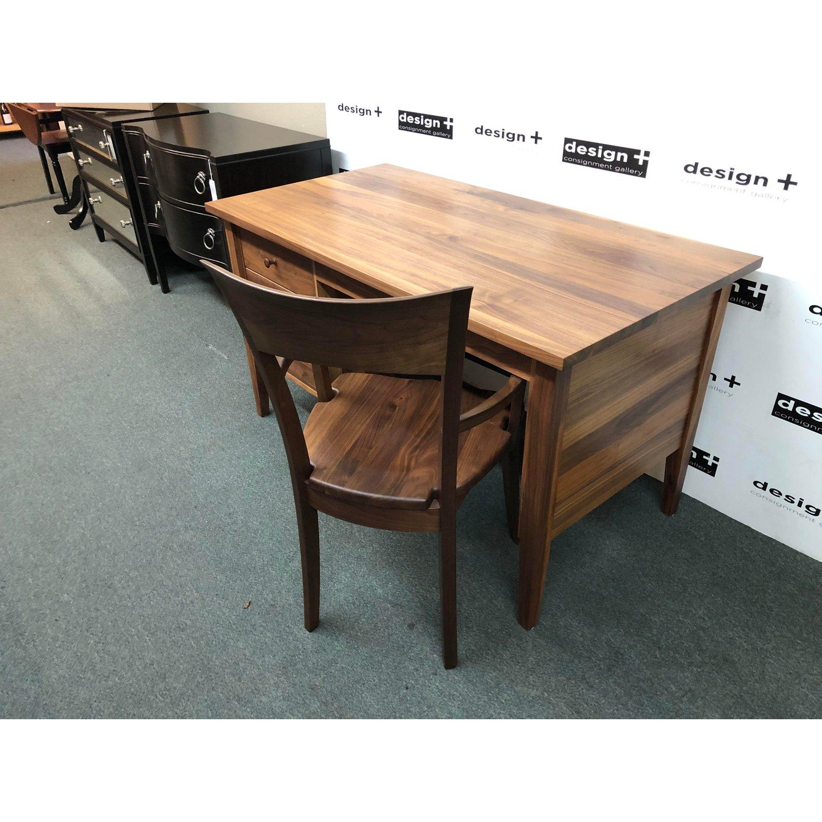 A custom executive desk by Vermont Woods Studio. Handcrafted of solid American black walnut, this Classic shaker beauty is a joy to behold and built to enjoy for generations. All drawers except the pencil drawer have full extension glides. The
