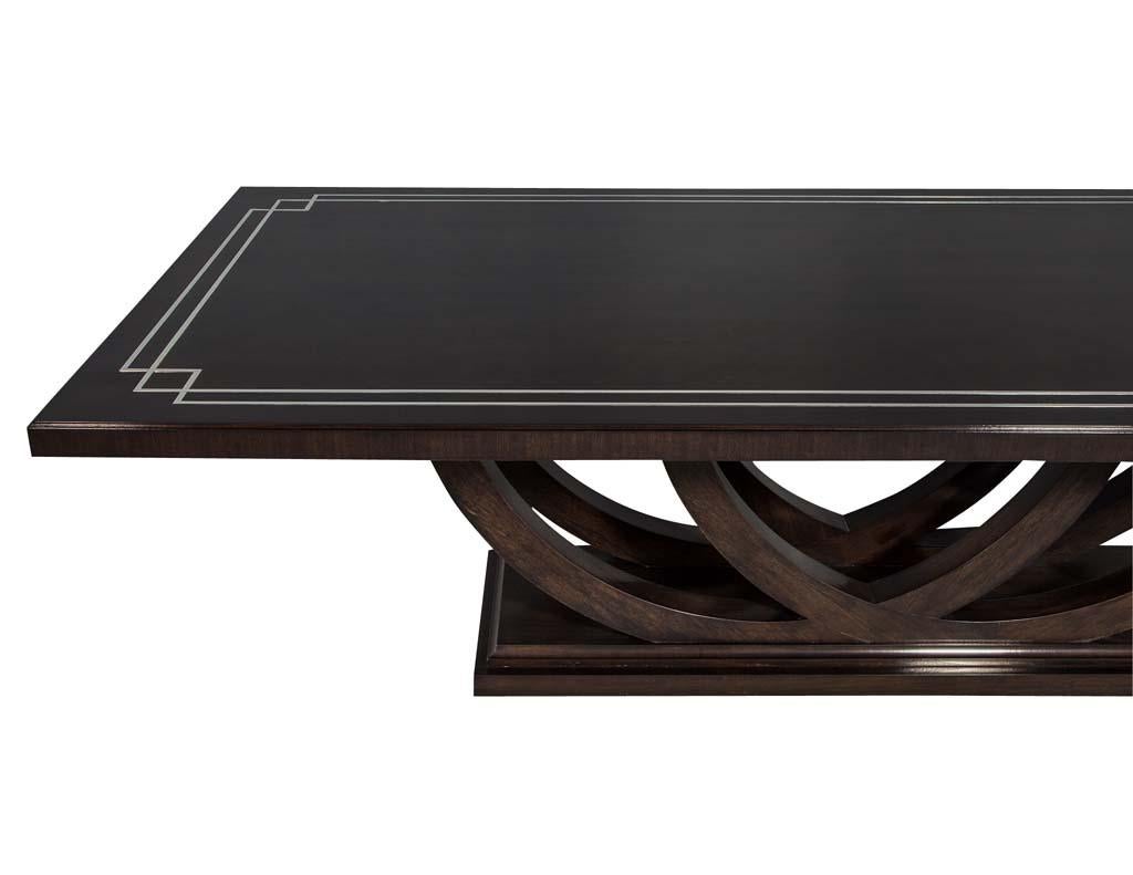Custom Walnut Dining Table with Polished Metal Inlay Details and Curved Base For Sale 3