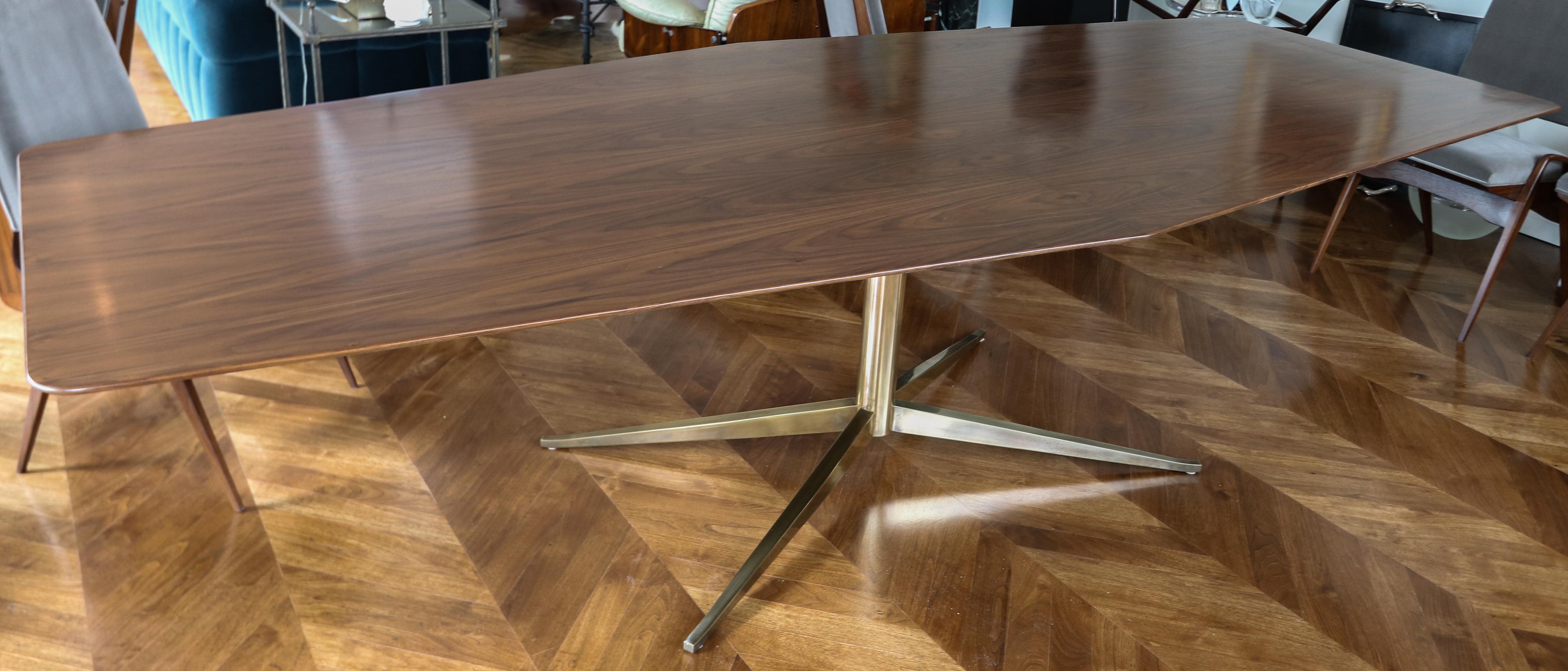 Custom rectangular pedestal dining table with American walnut veneer and brass leg.  Made in Los Angeles by Adesso Import. 

Measures: end depth 34