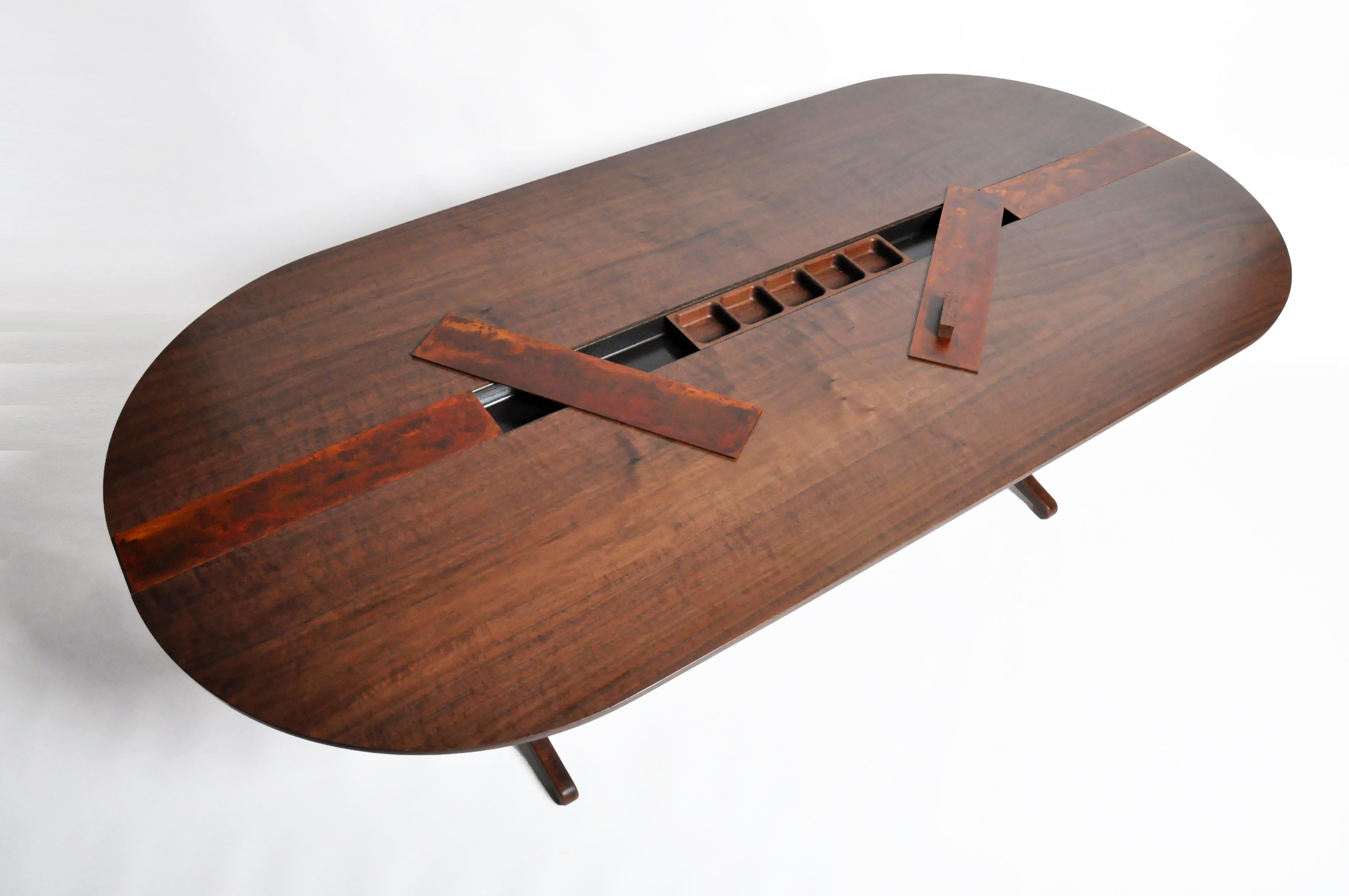 Walnut table by Modern Industry. Walnut wood and metal, 2019. On display at The Golden Triangle for our 30th Anniversary Celebration and Global Best. Born in Minneapolis, Minnesota, Jacob Wener began woodworking at a very young age. He never stopped