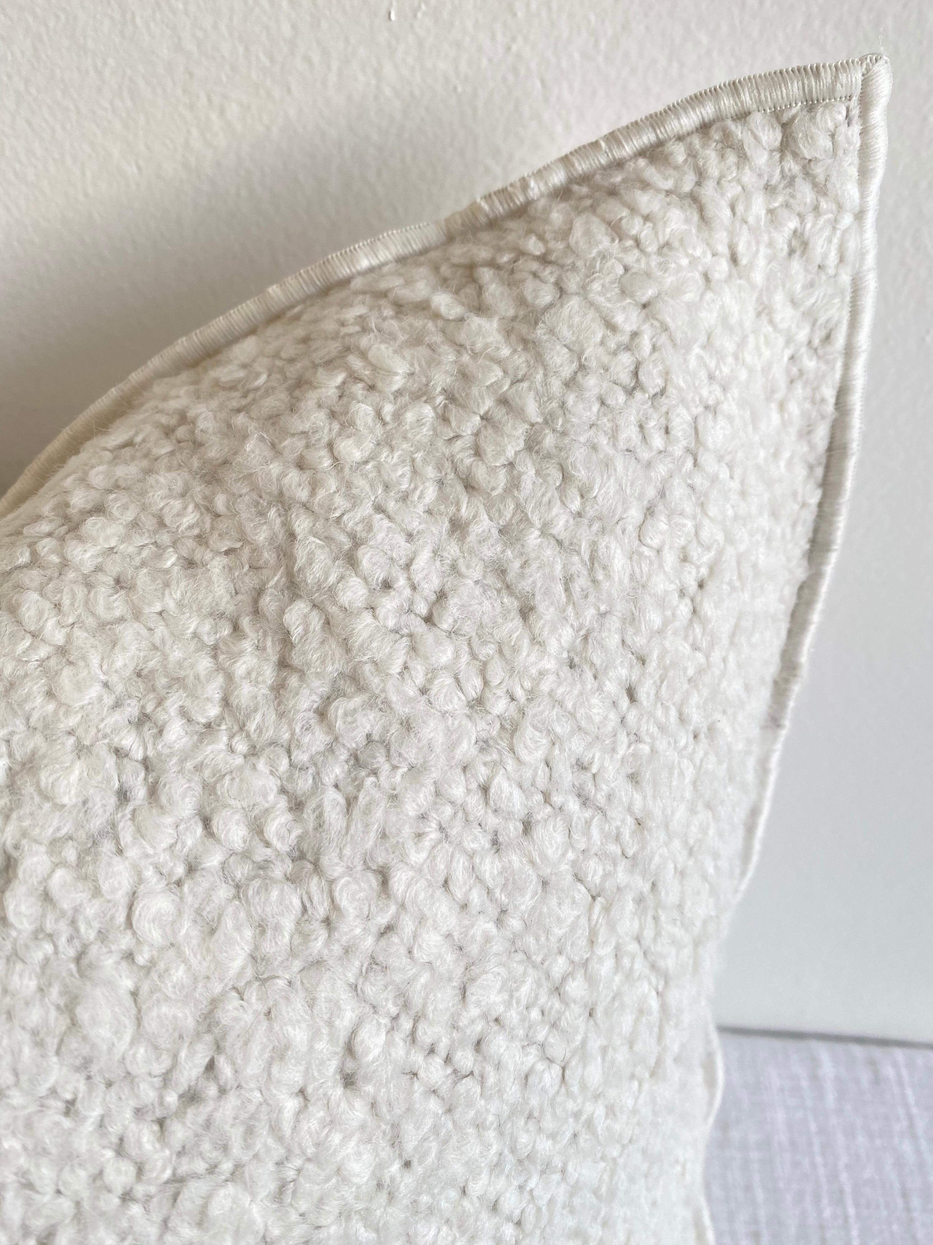 Custom wool and linen blend accent pillow with down insert Color: Toile Yeti / Blanc A creamy white colored nubby boucle style pillow with a stitched edge, metal zipper closure. Our pillows are constructed with vintage one of a kind textiles from