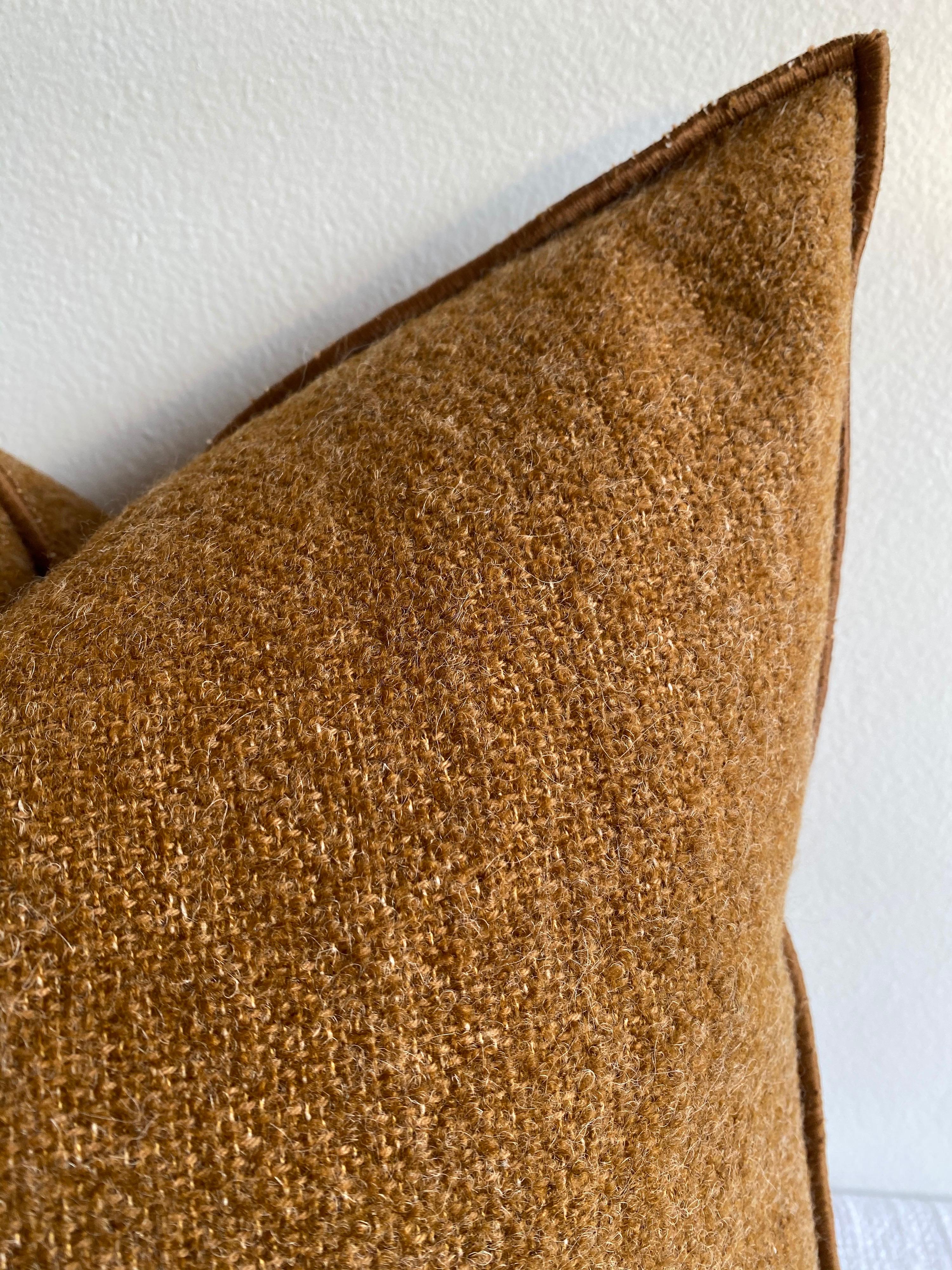 Custom wool blend accent pillow with down insert
Color: Terracotta
A deep rust colored nubby boucle style pillow with a stitched edge, metal zipper closure.
Size 20