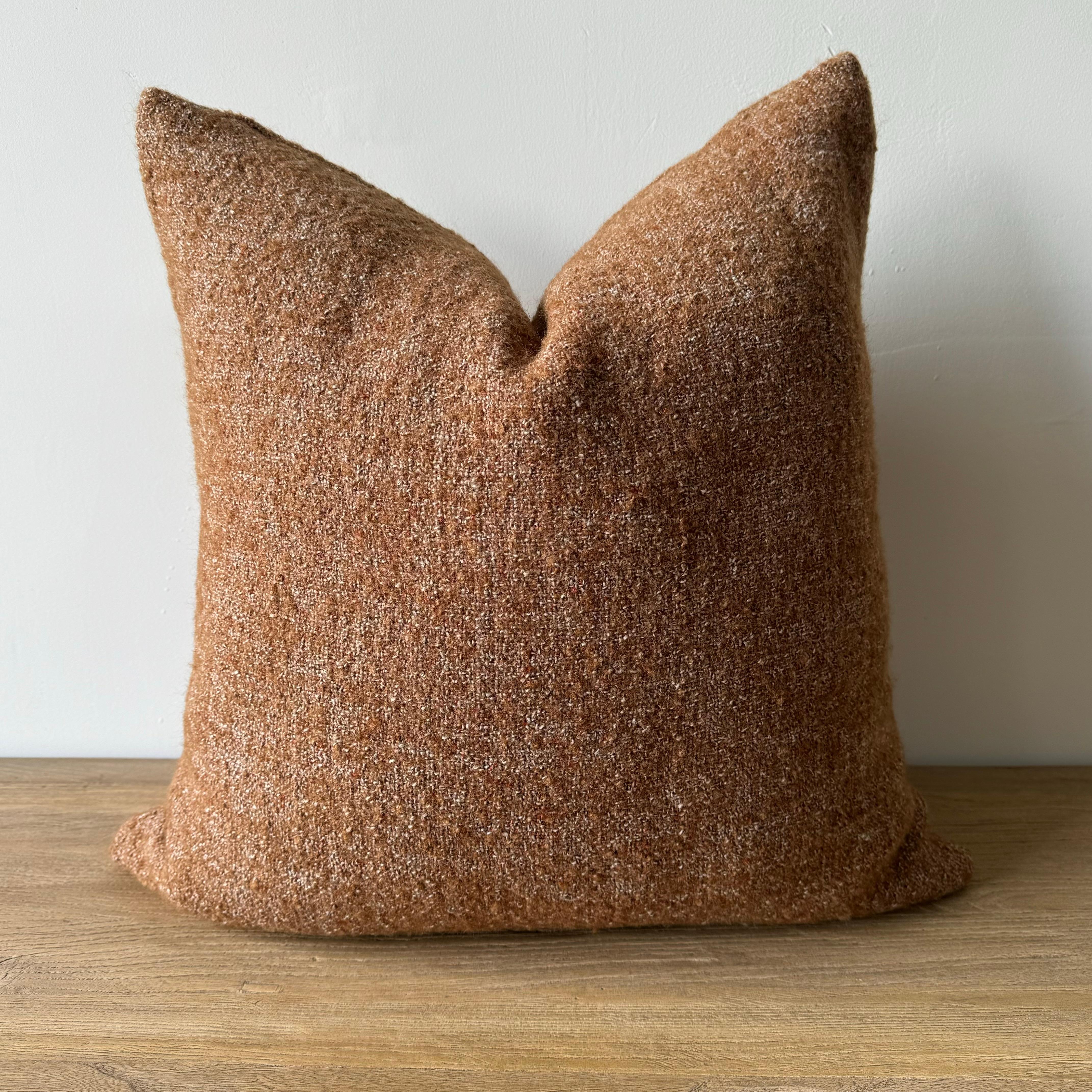 Rusty /Terracotta /Brown and Oatmeal Wool Accent Pillow
Rusty brown and natural flax oatmeal woven fibers in a stonewash finish create this luxurious soft pillow. Sewn with an antique brass zipper closure and overlocked edges. We offer custom sizes,